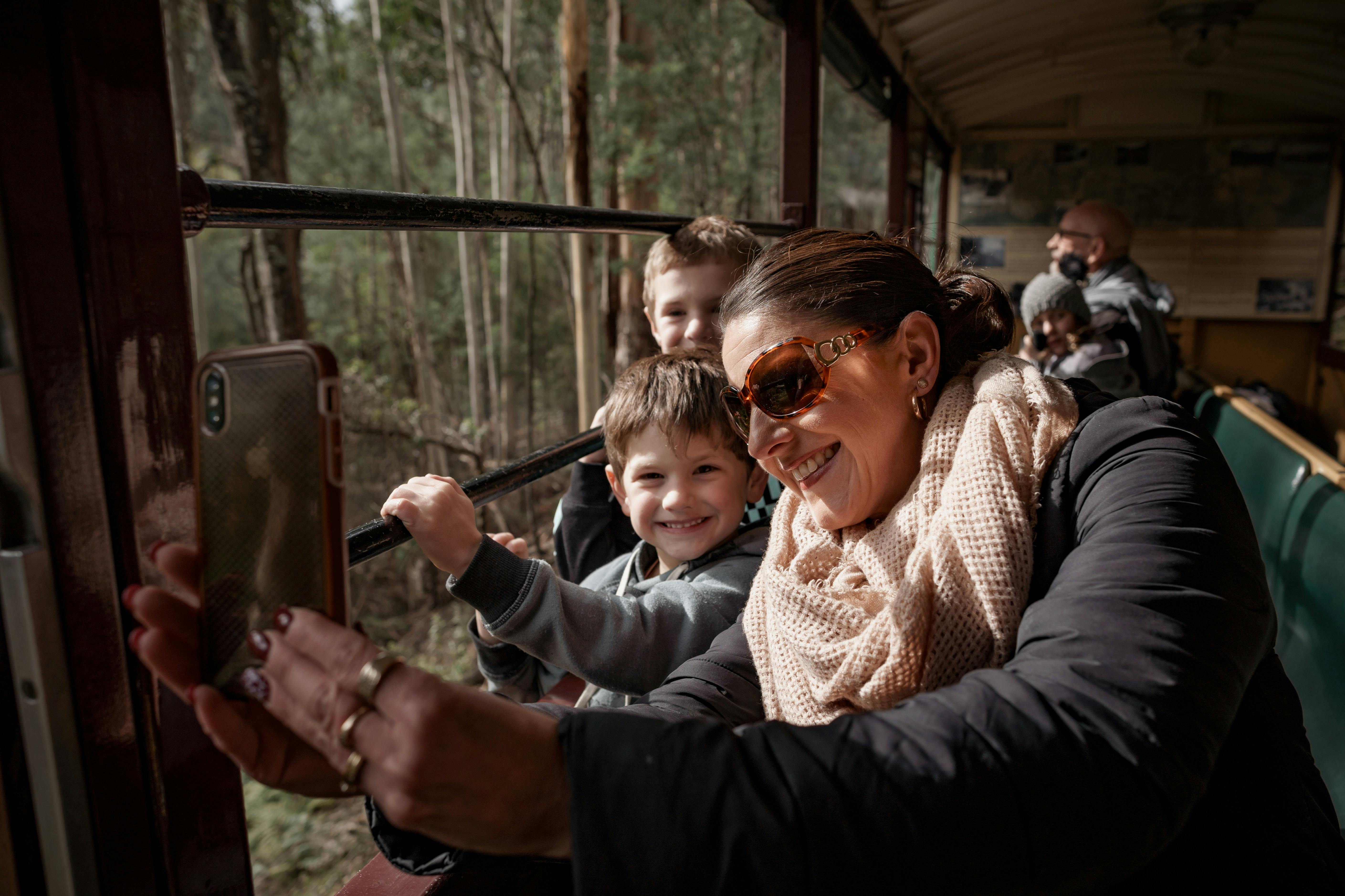 Family on board Puffing Billy's Excursion Train