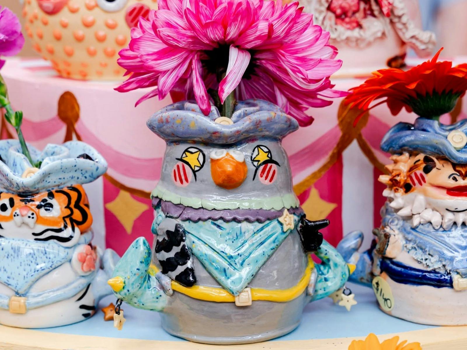 A close up shot of a colourful pigeon vase