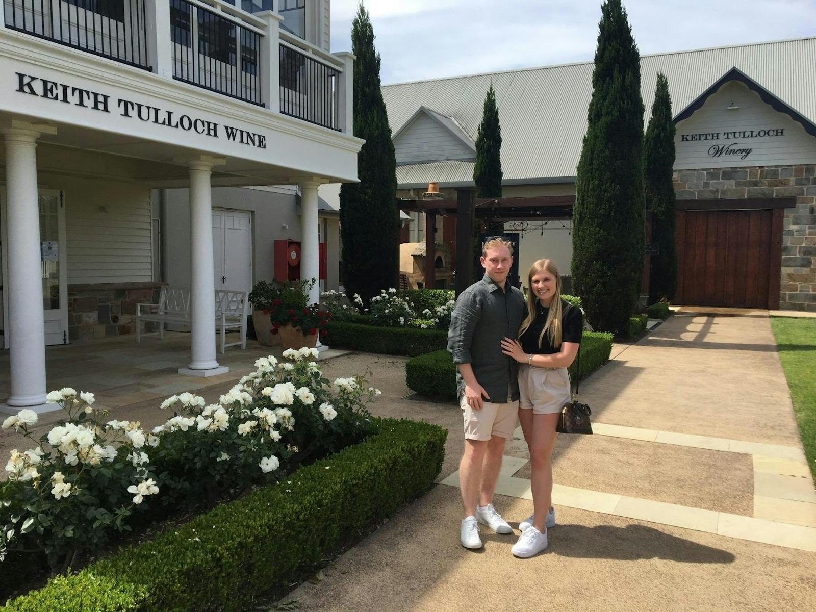 two people out front of cellar door