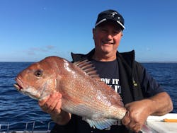 Man holding good size snapper