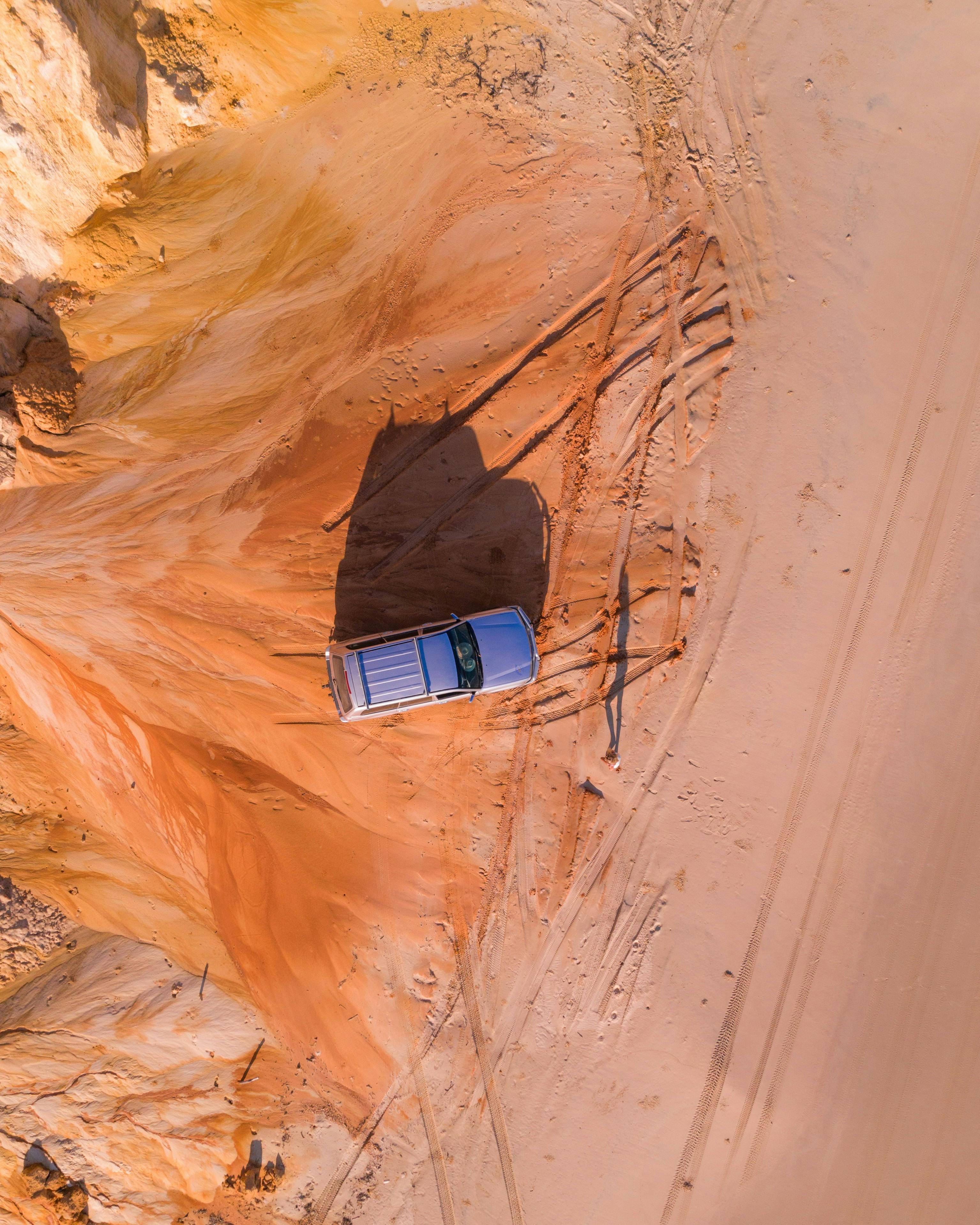 72 different shades of sand in the coloured cliffs of Rainbow Beach!