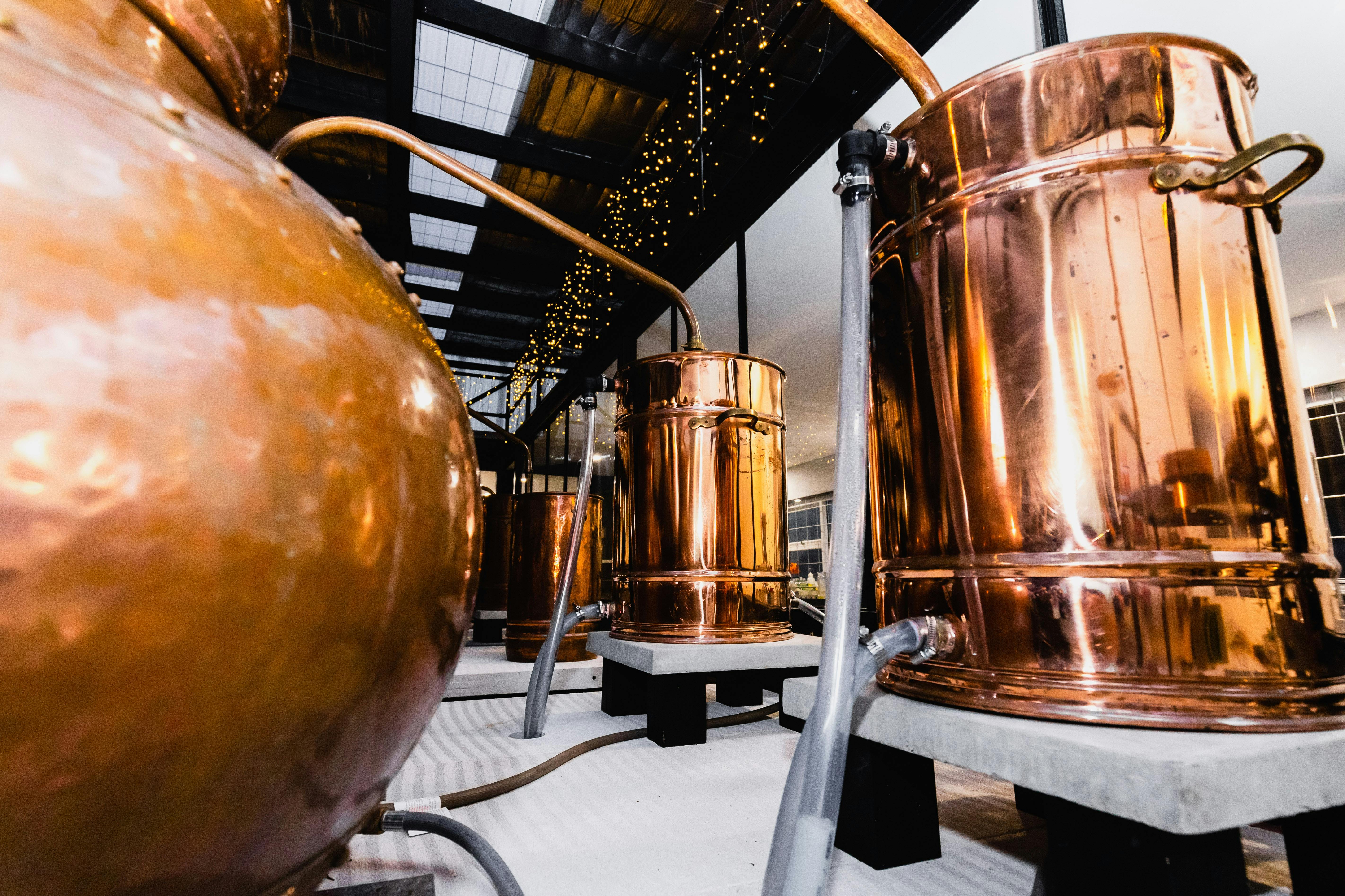 Traditional copper pot stills used to make the distillations