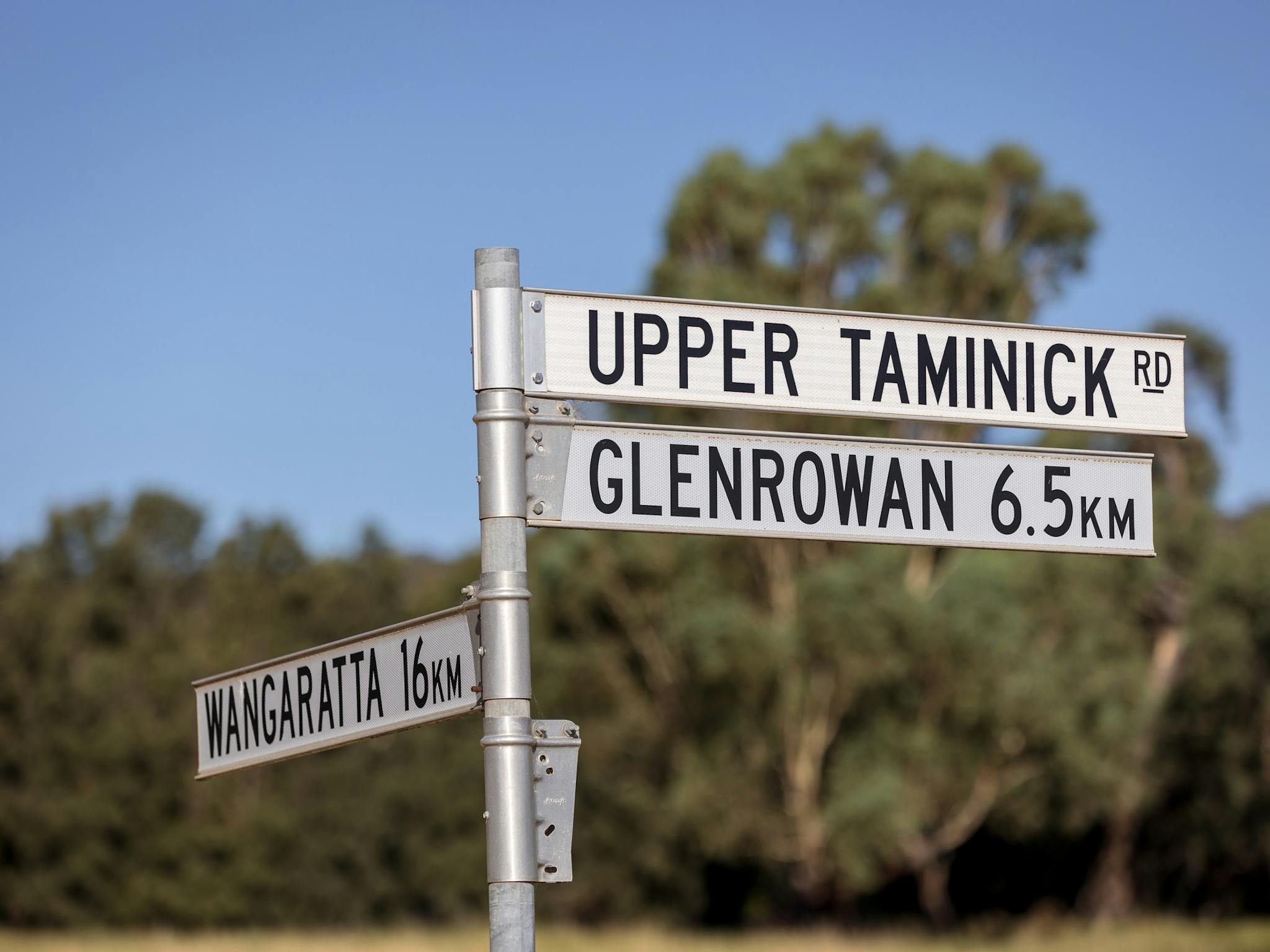 Street signs on a post, Upper Taminick Rd, Glenrowan, Wangaratta