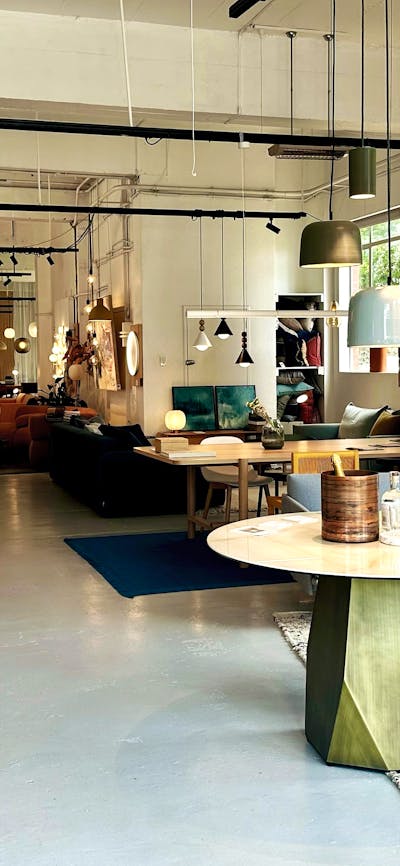 Image of Miko showroom, featuting furniture, lighting and rugs.