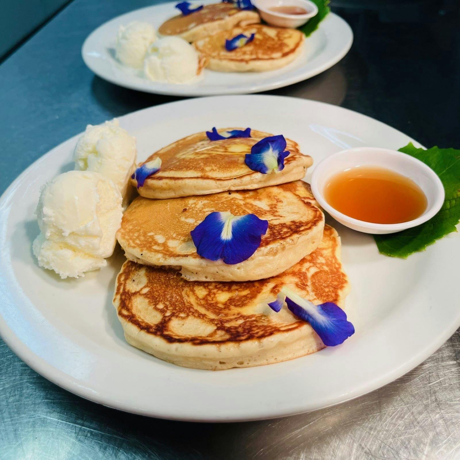 Pancakes with syrup and ice cream