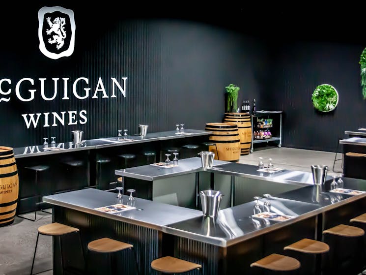 McGuigan wines group tasting area with bar and seating