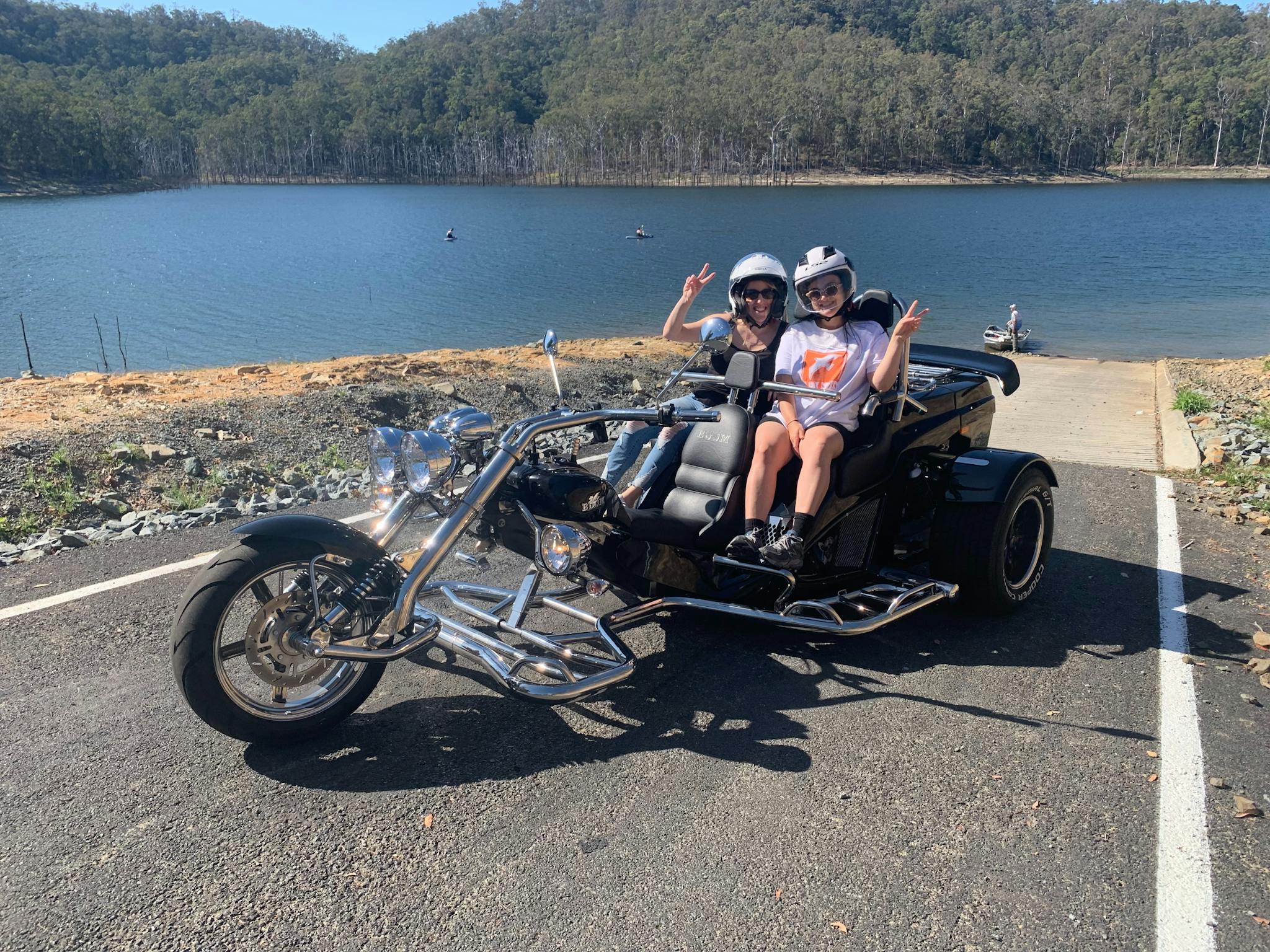 Image shows a boom mustang trike parked near the waterfront of Hinze Dam. Image shows a boom mustang trike parked near the waterfront of Hinze Dam.