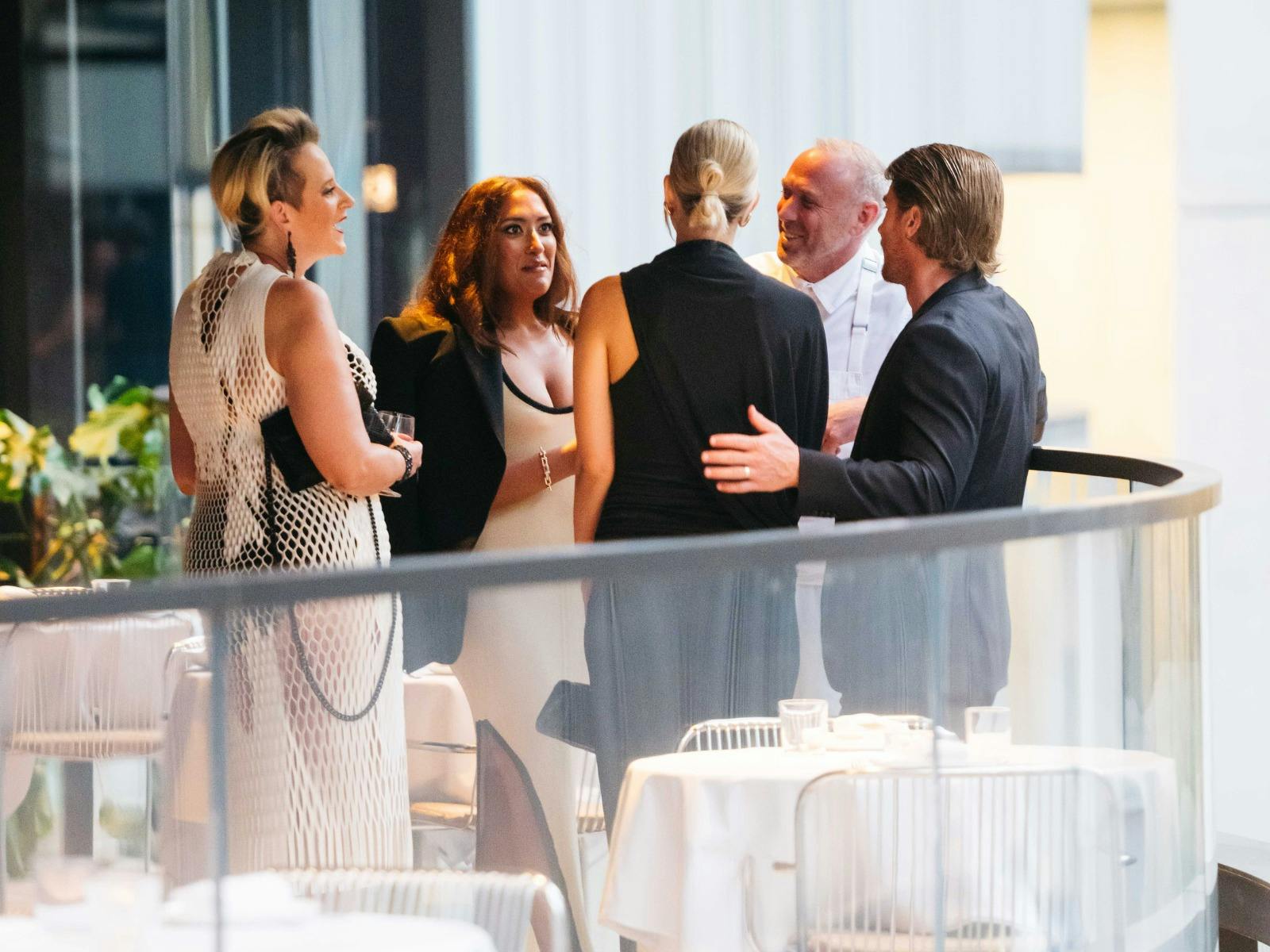 Well dressed people talking