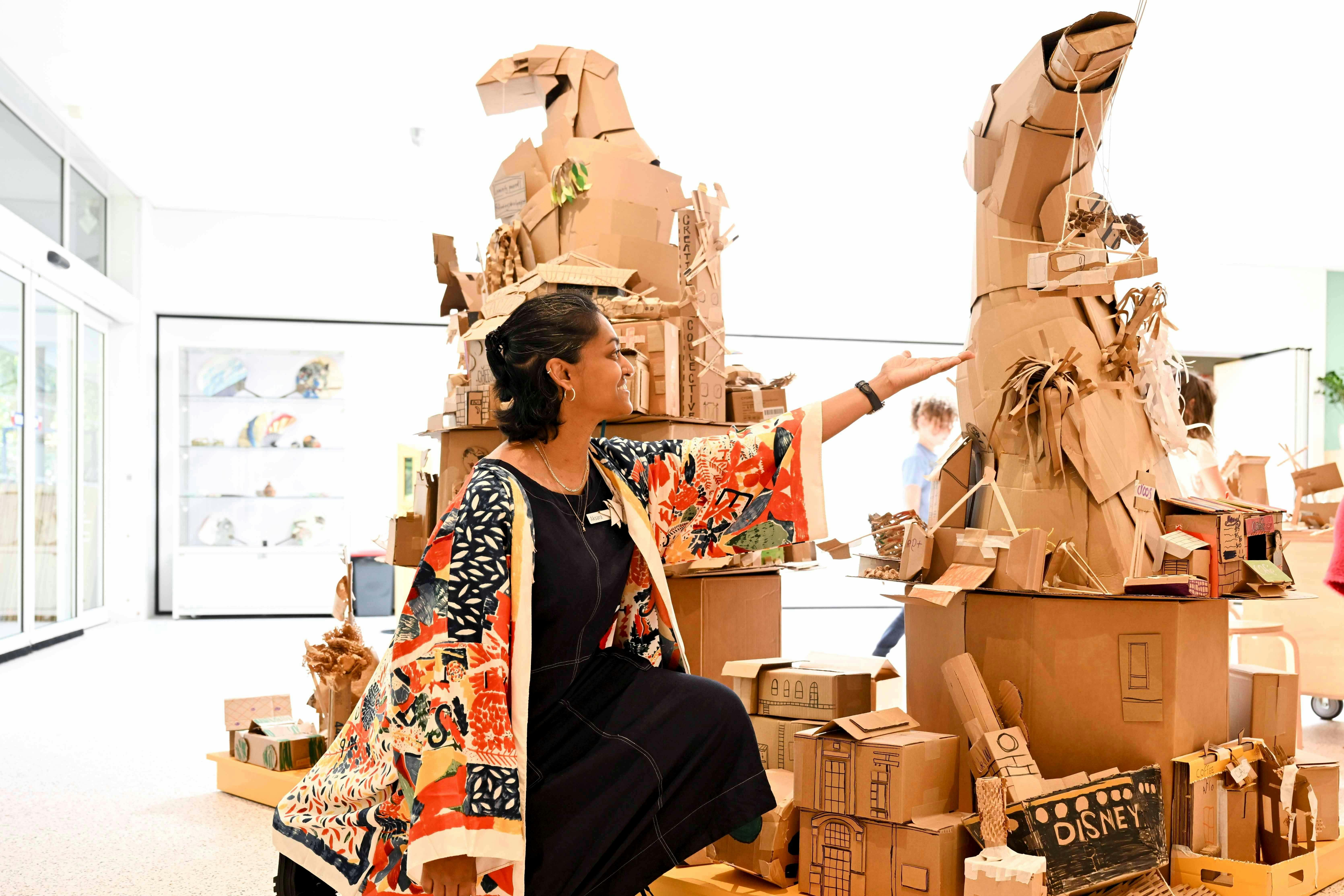 Artist with her artwork
