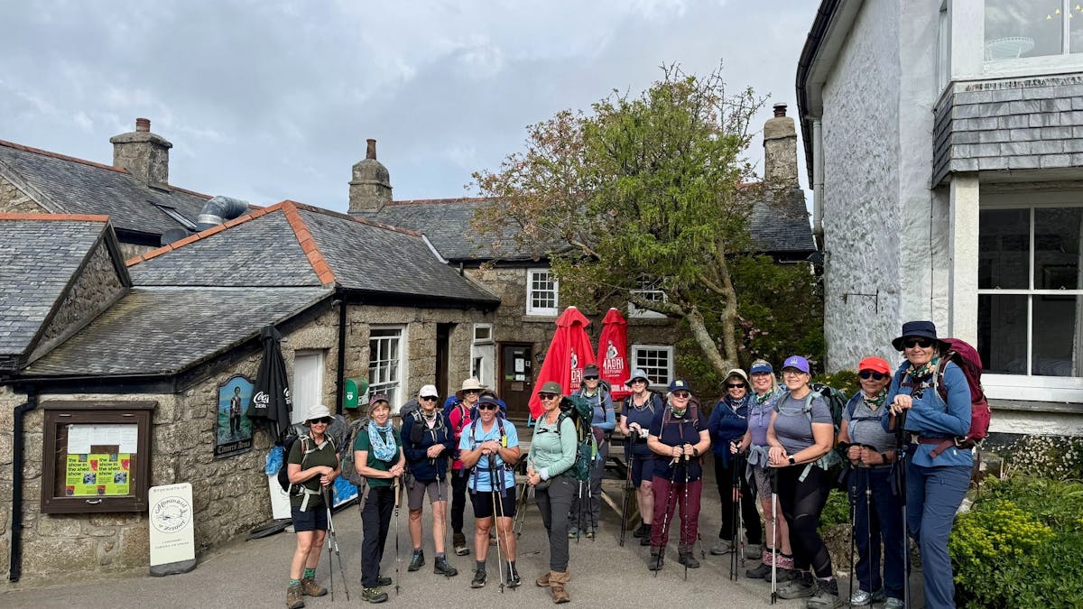 Women hiking in the UK on the Cornwall Coast