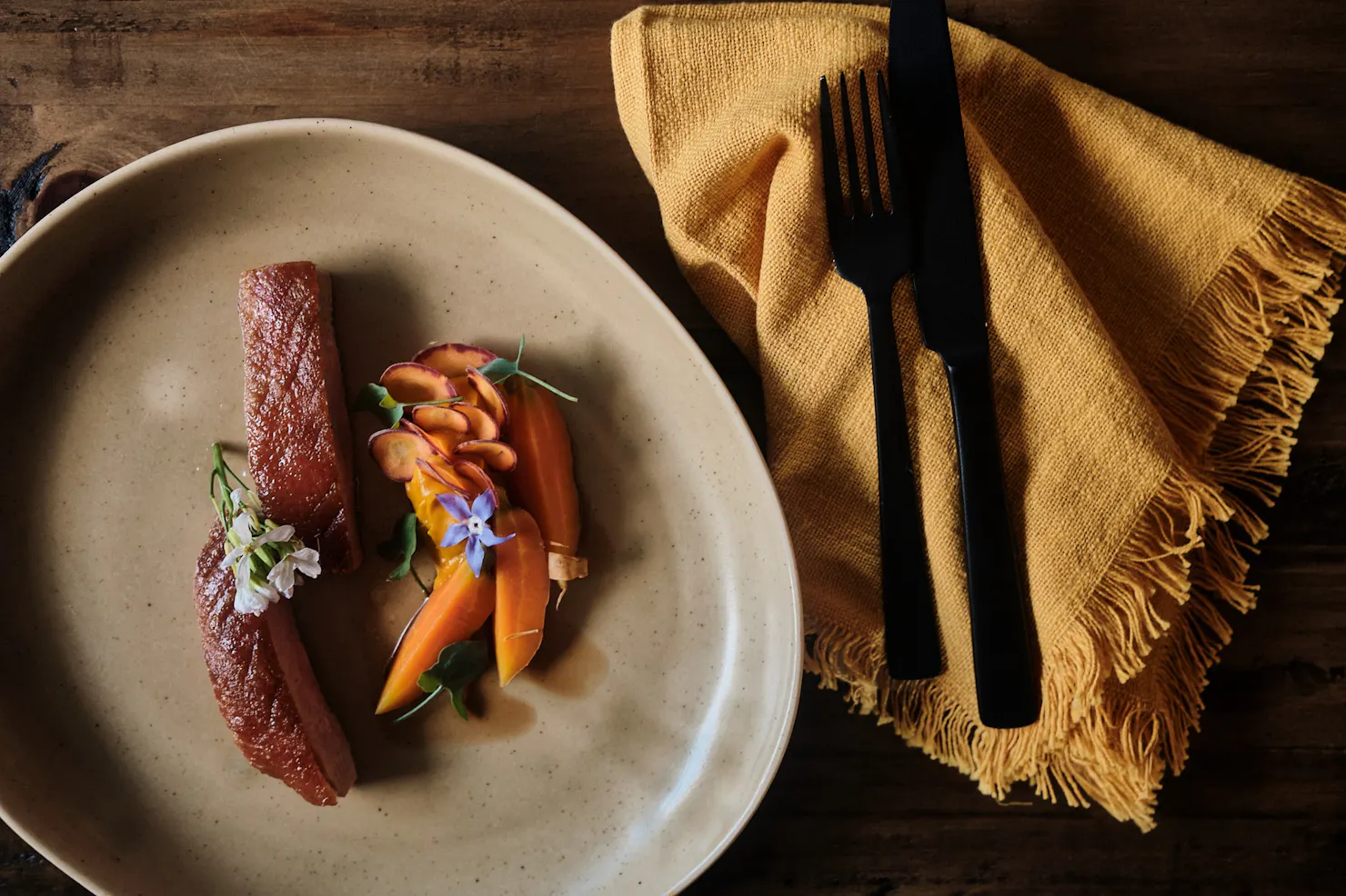 Duck served with carrots and ginger