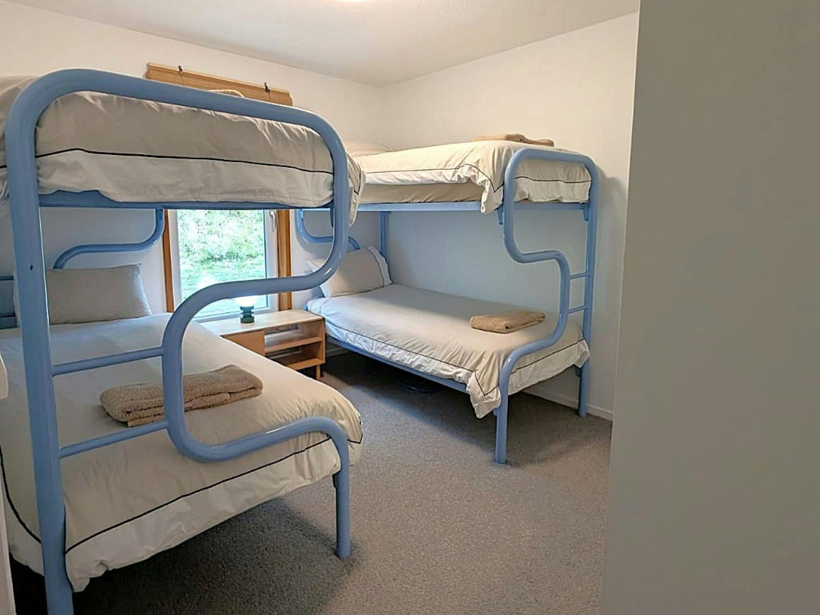 Room with two bunk beds
