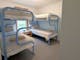 Room with two bunk beds