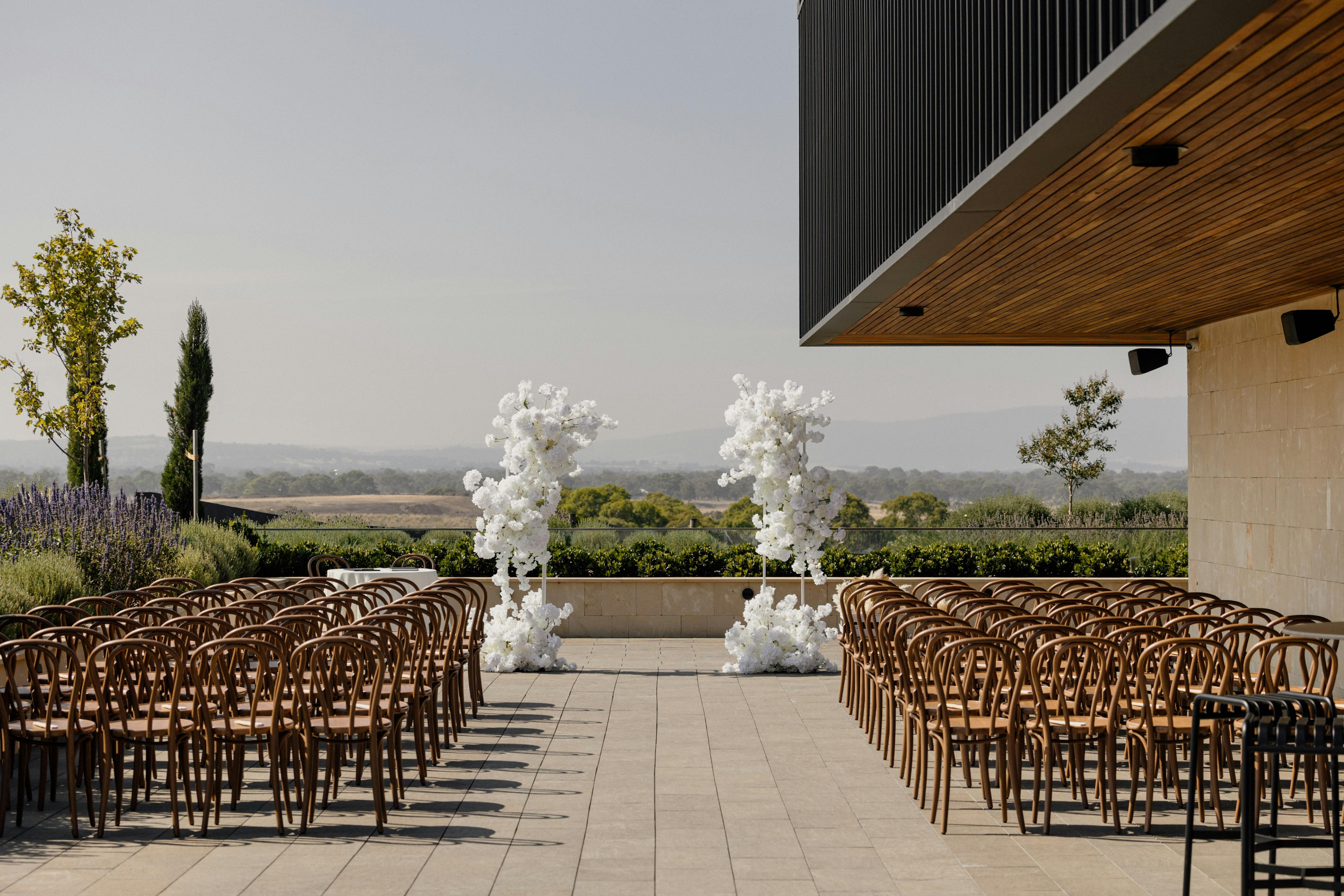 outdoor wedding ceremony on the outdoor terrace, with views to the north
