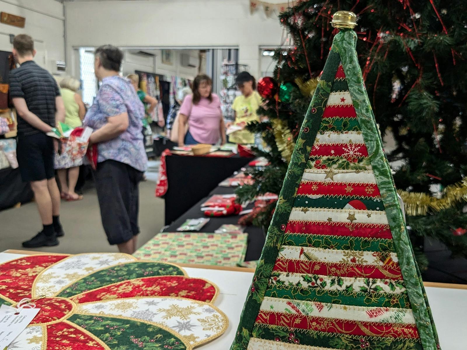 Embroidered Christmas-themed items at Caloundra Arts Centre's Artisan Fair