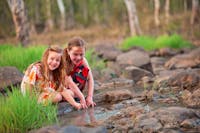 kids playing in stream