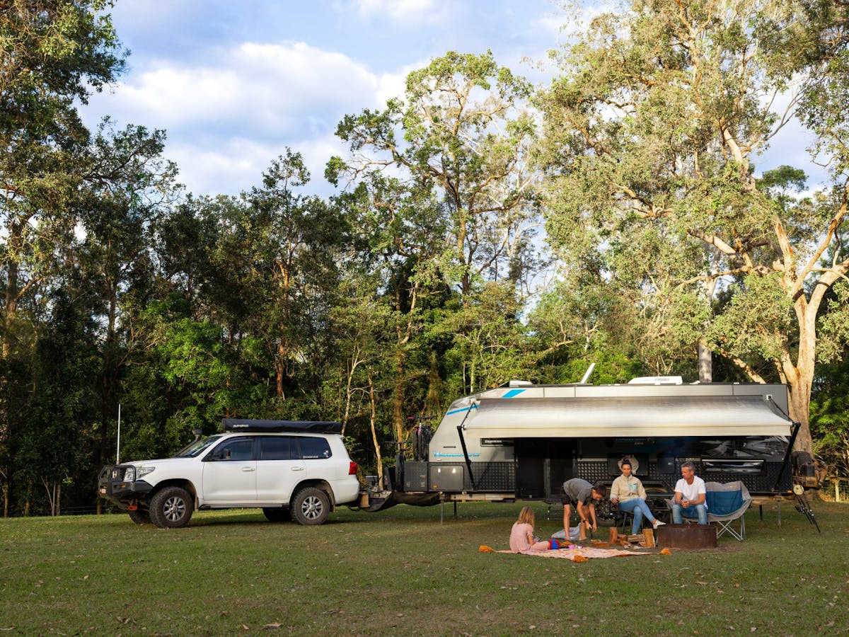 Family realxing the afternoon away at their campsite