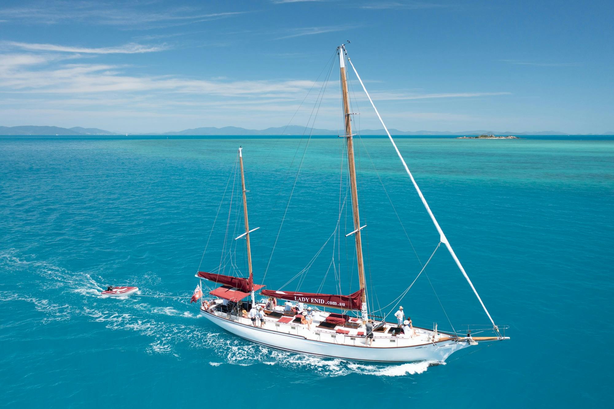 Lady Enid Sailing past Langford Island Whitsundays from Airlie Beach