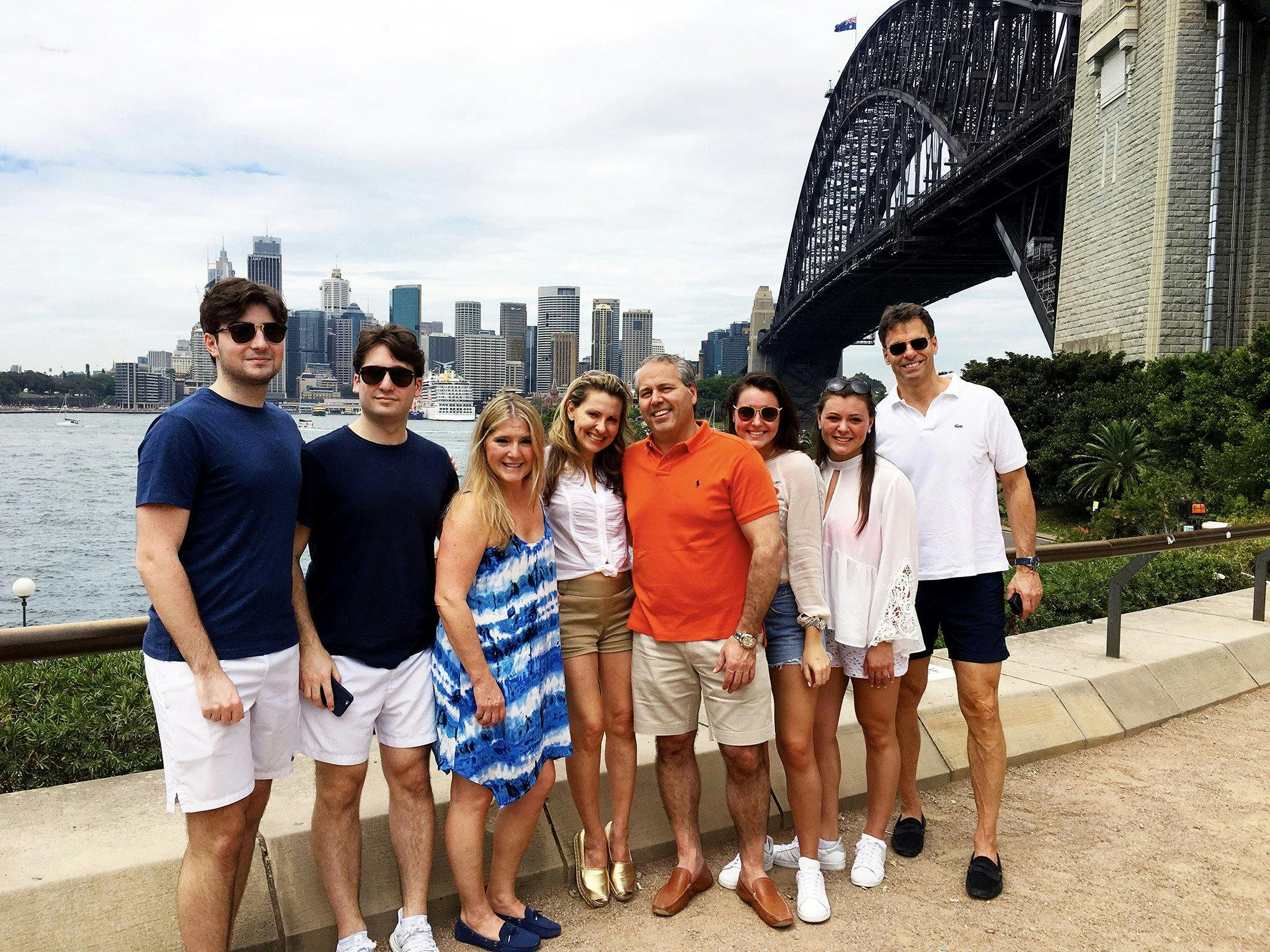 Family Group on a Sydney City Sights tour in front of the Harbour Bridge near Kirribilli