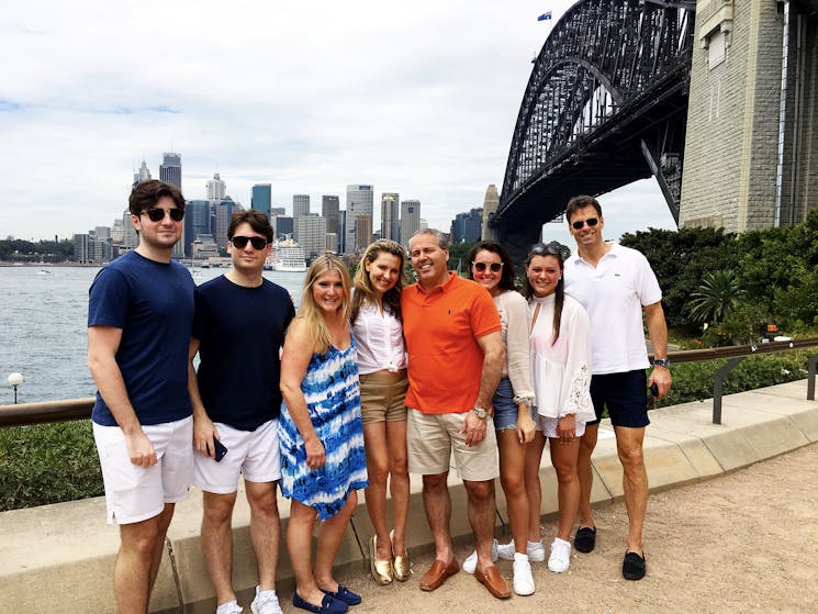 Family Group on a Sydney City Sights tour in front of the Harbour Bridge near Kirribilli