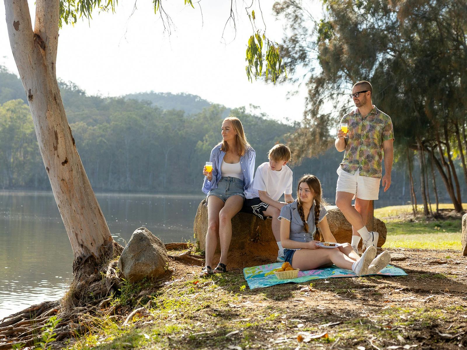 Young travellers enjoying a picnic at No 7 Dam, Mount Morgan. Young travellers enjoying a picnic at No 7 Dam, Mount Morgan.