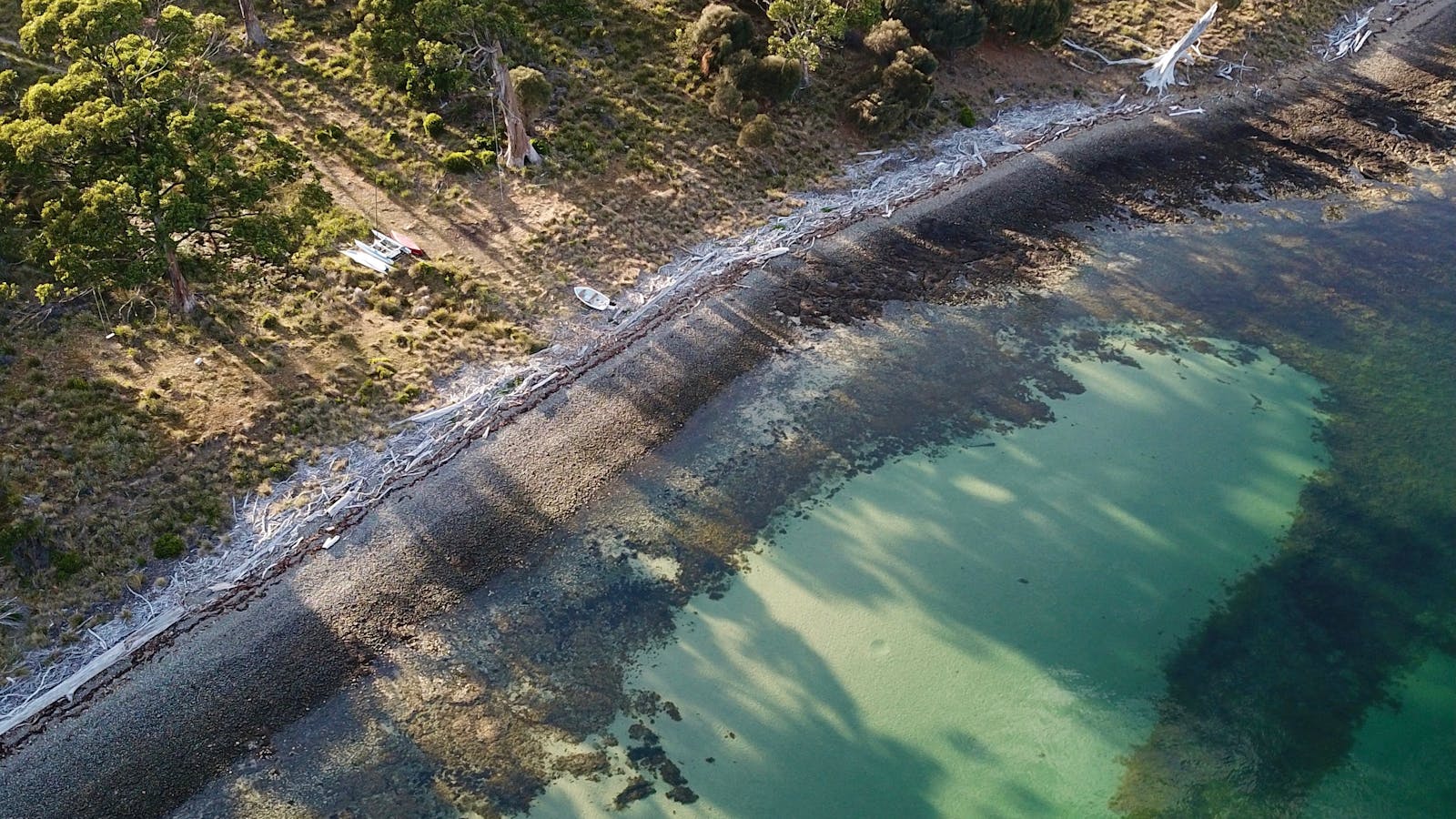 drone photo of the coastline and accomodation