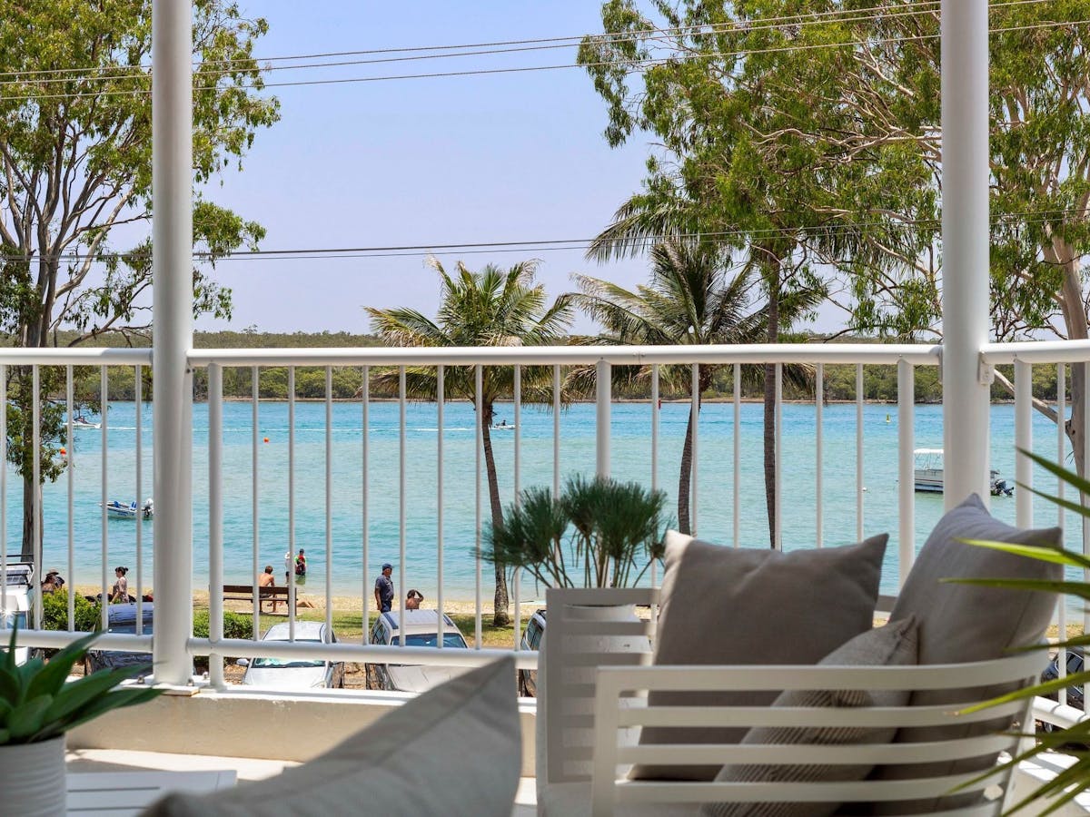 Open plan living spills out to furnished balcony with BBQ Open plan living spills out to furnished balcony with BBQ