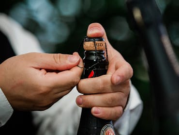 Uncorking a bottle