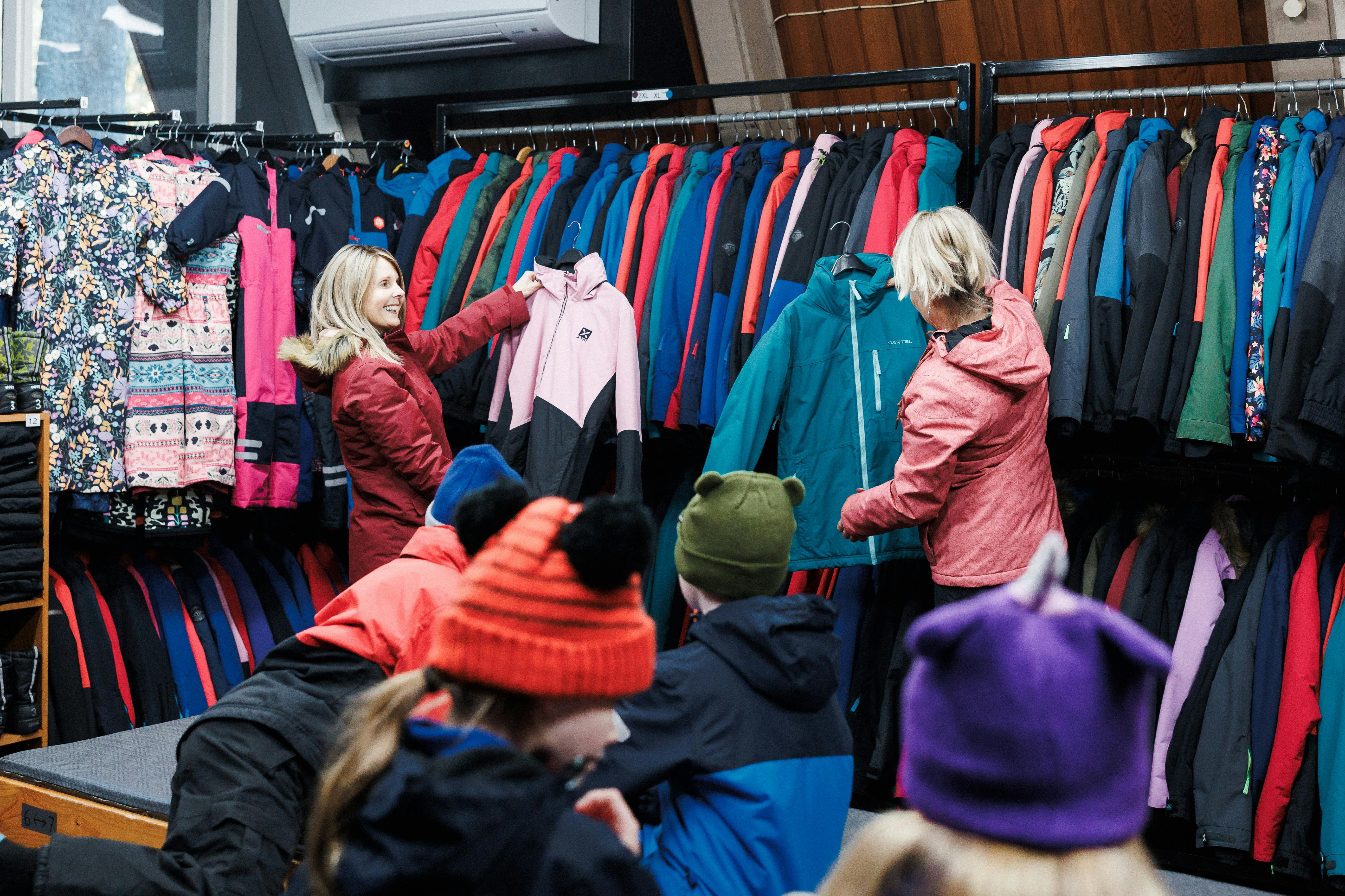 Guests selecting rental clothing