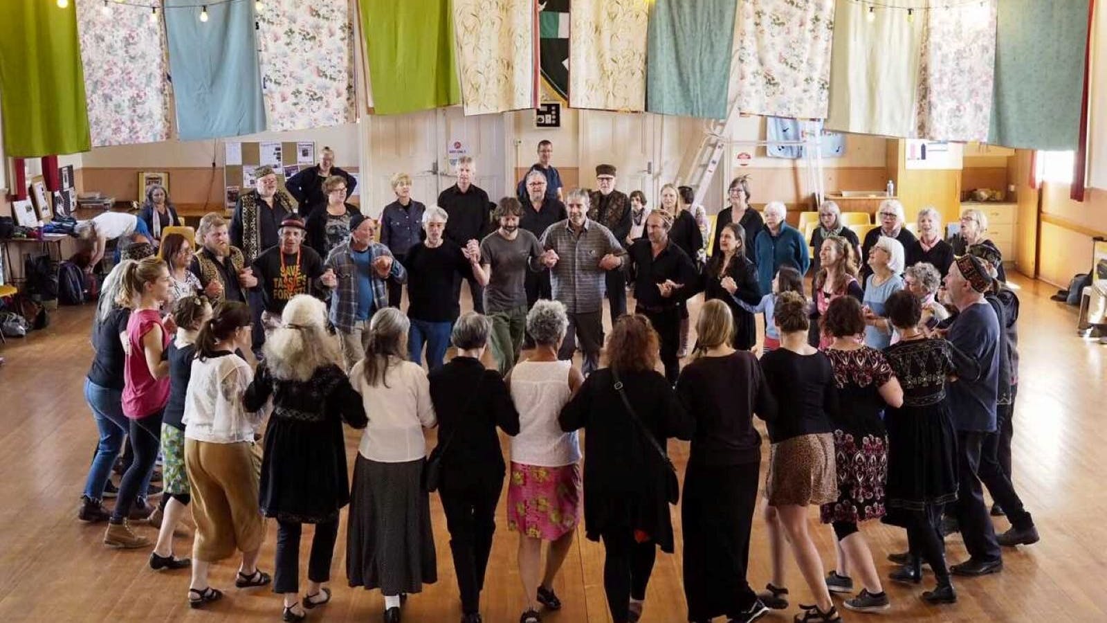 The choir warming up to entertain the crowds