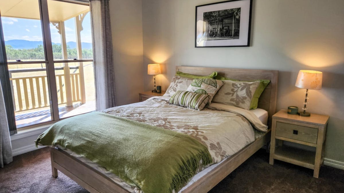 Bedroom 3: Queen bed with dresser views