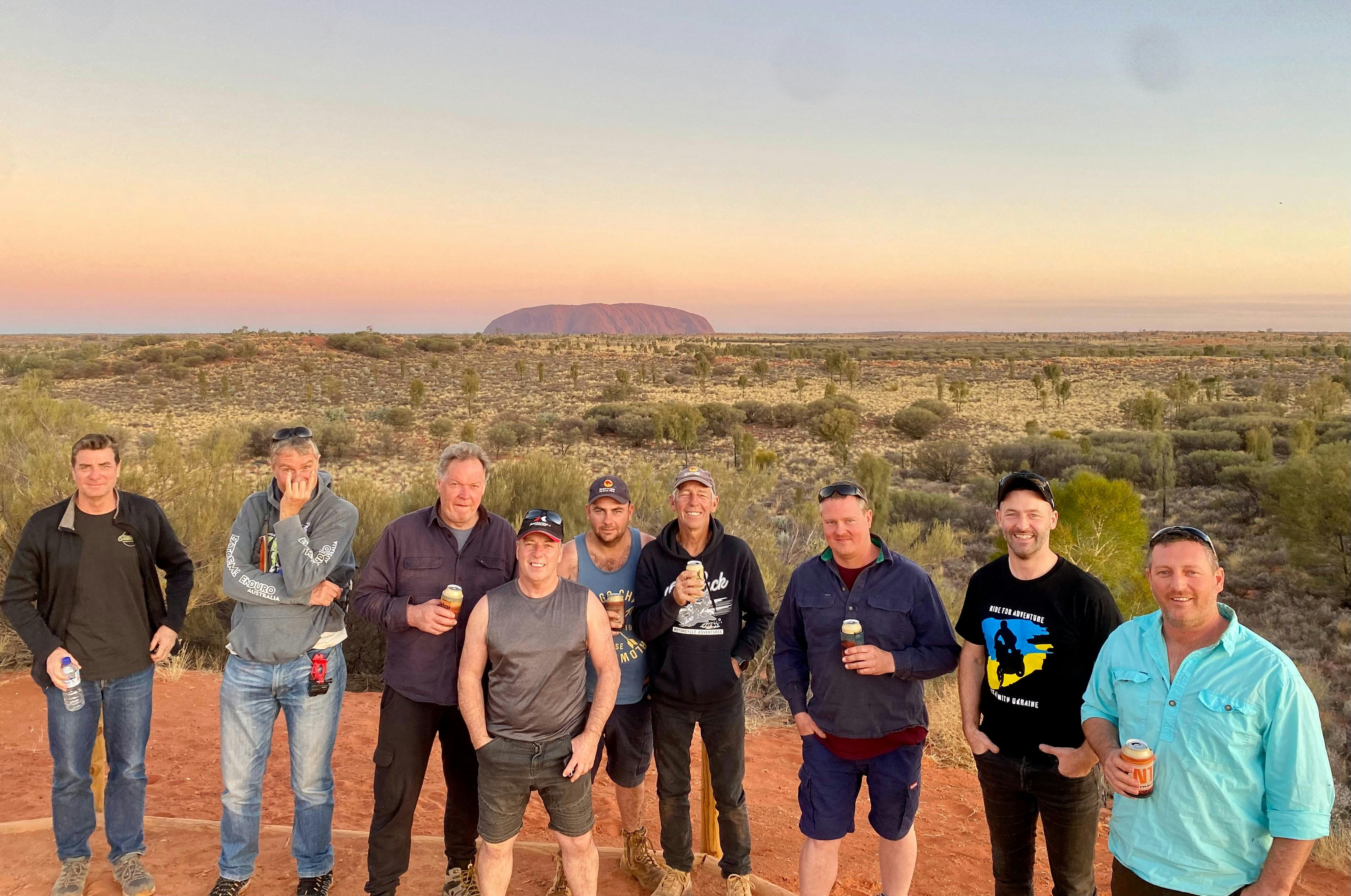 Customers enjoying the sunset over Uluru