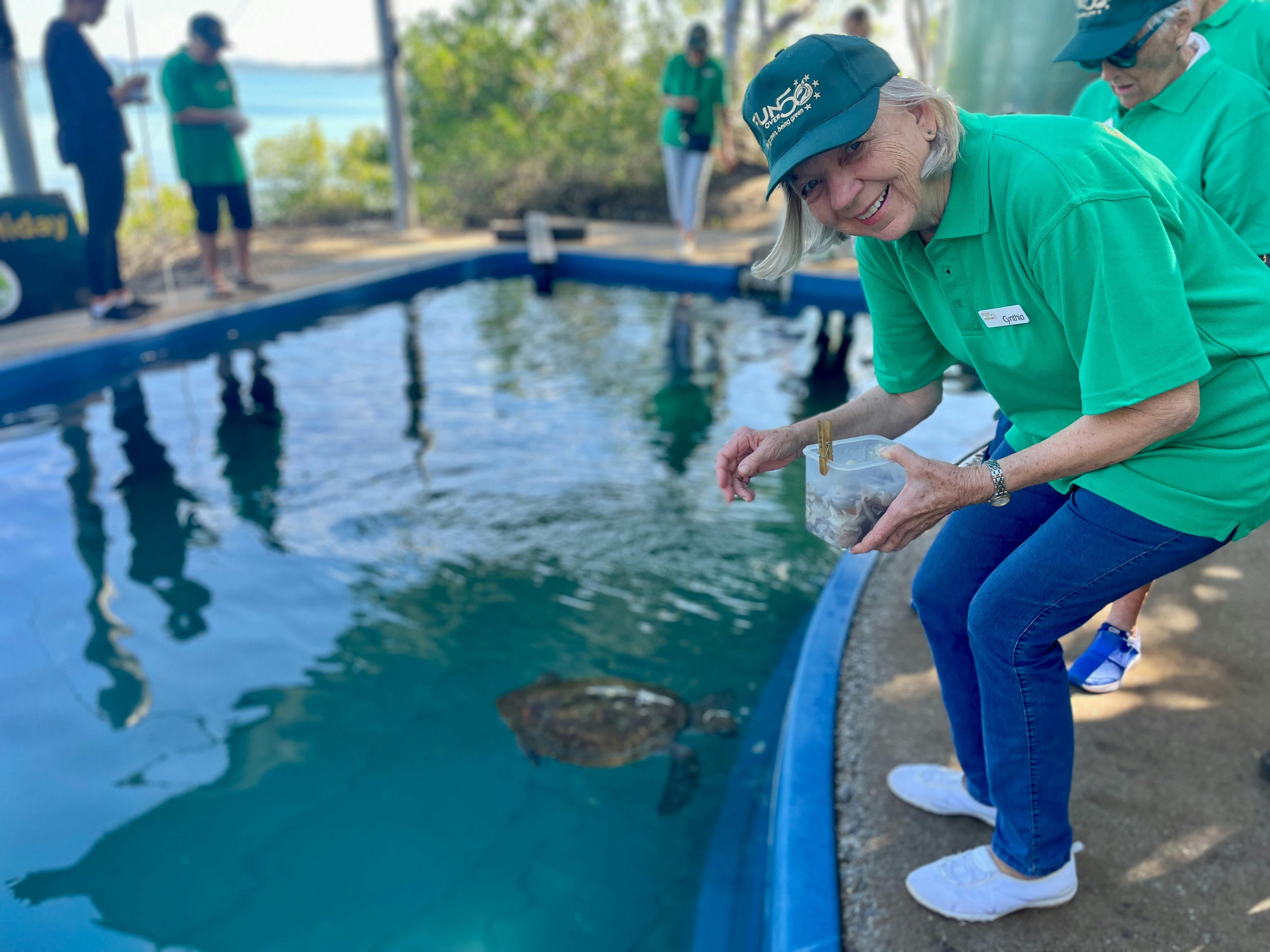 FUNstar Cynthia feeding Del the turtle
