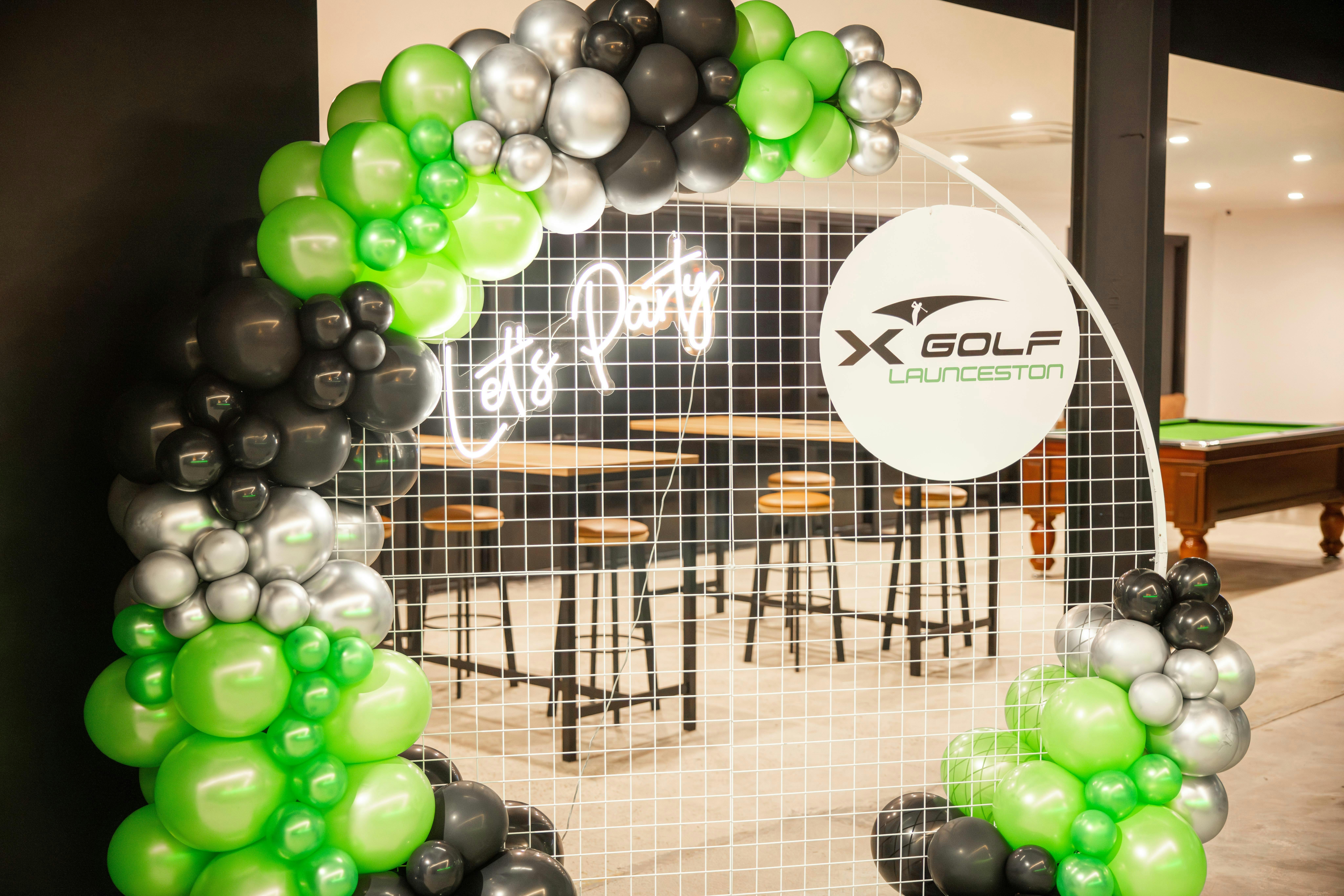 X-Golf Laucneston Venue With Arch Balloons and Logo