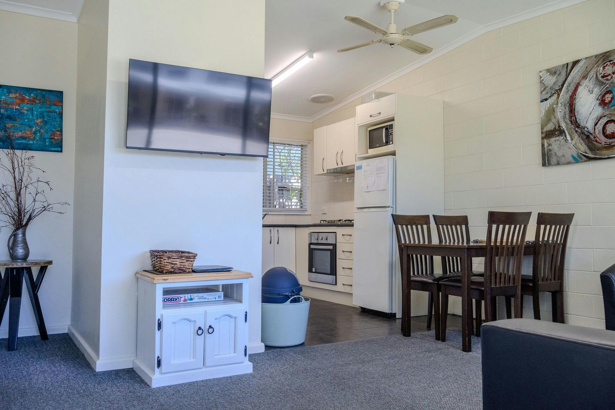 Full kitchen and dining area in a Silver Bream Motel self-contained unit