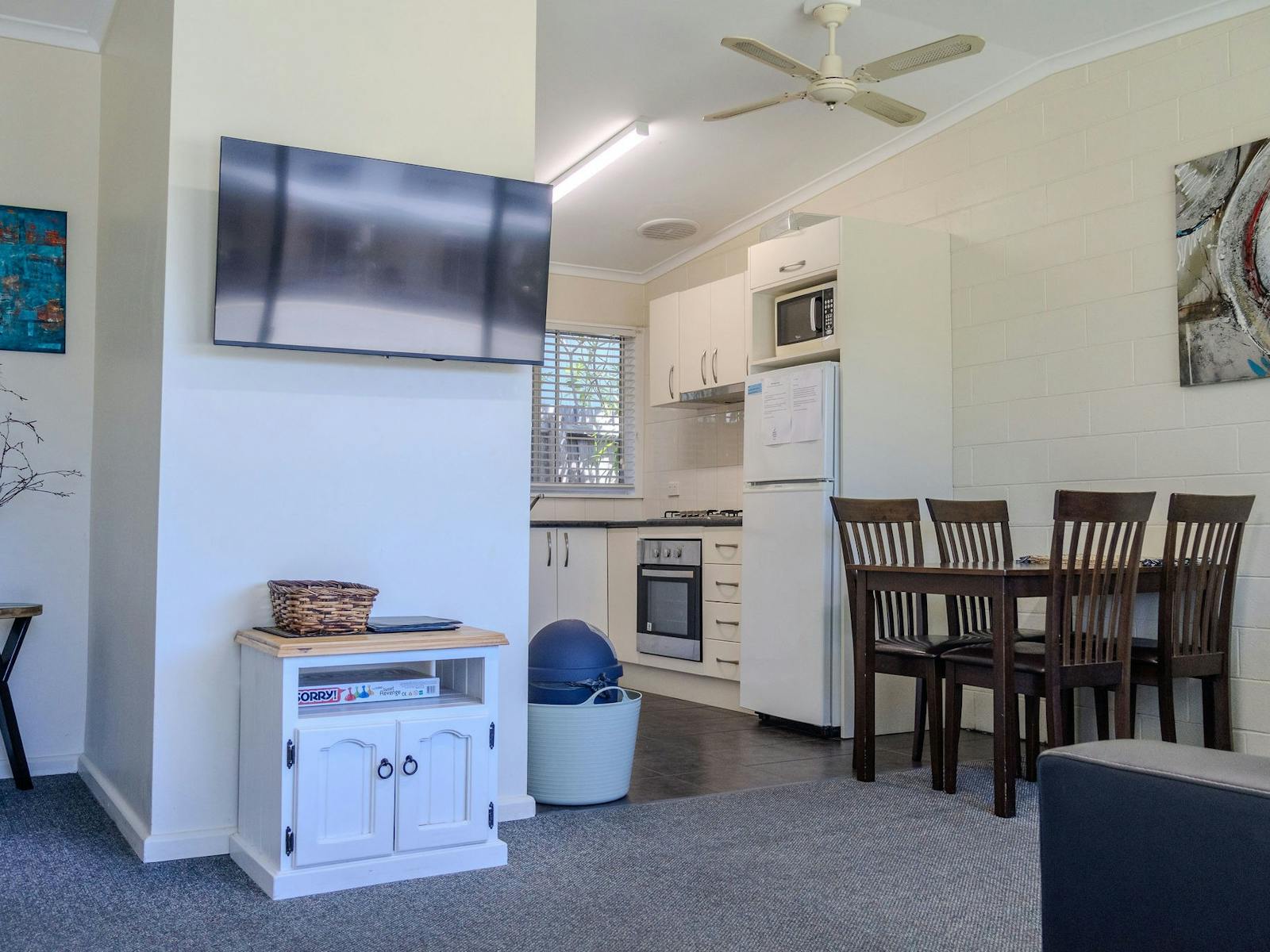 Full kitchen and dining area in a Silver Bream Motel self-contained unit