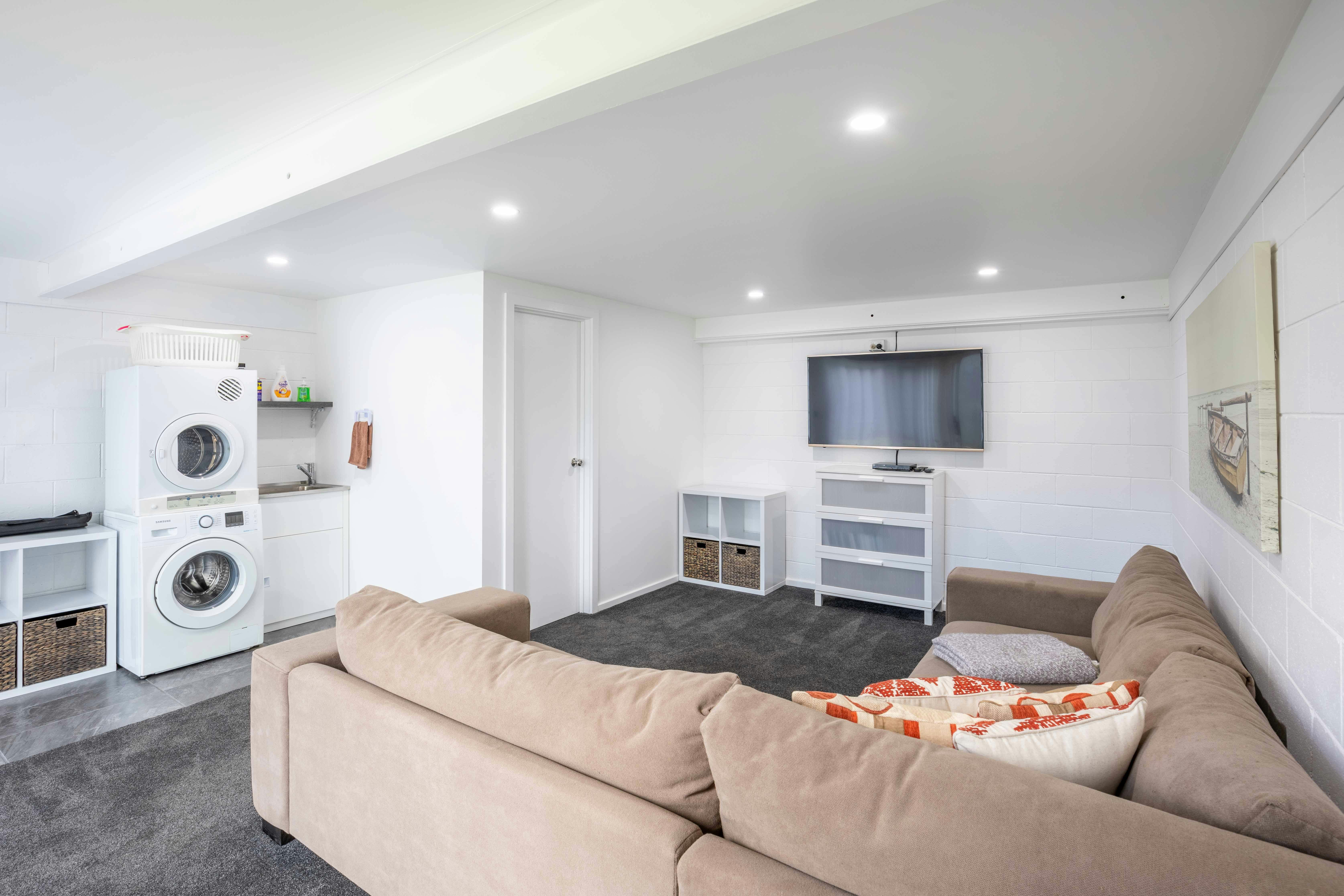 Down stairs lounge, bathroom and laundry