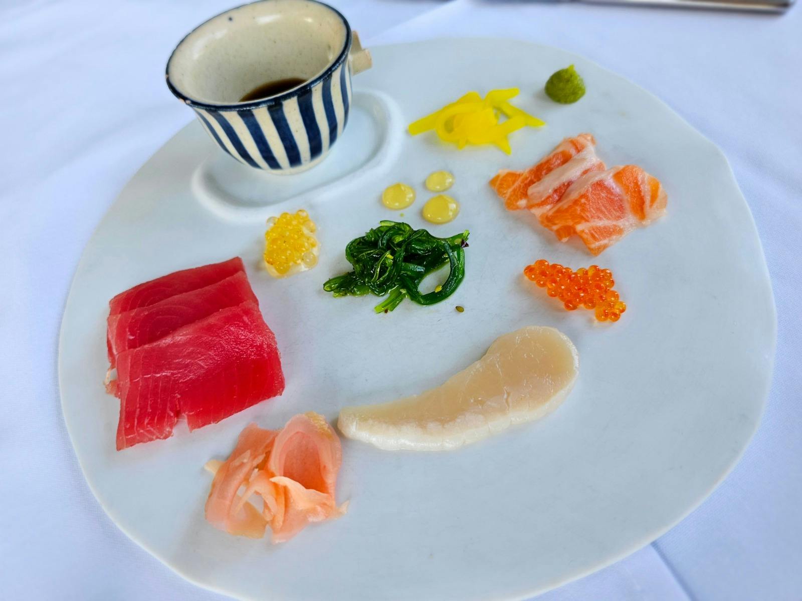 Tro of Sashimi featuring Tuna, Atlantic Salmon and WA Pearl Meat Tro of Sashimi featuring Tuna, Atlantic Salmon and WA Pearl Meat