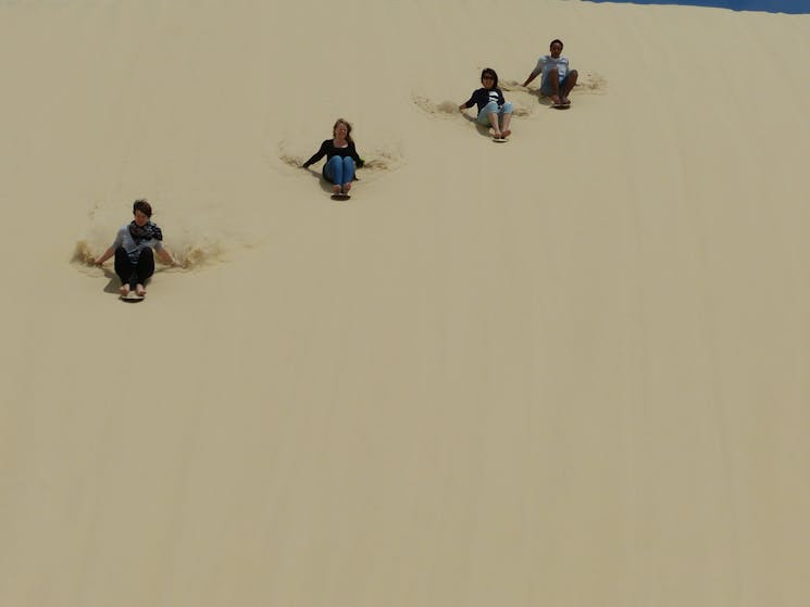 Sandboarding at Birubi Point