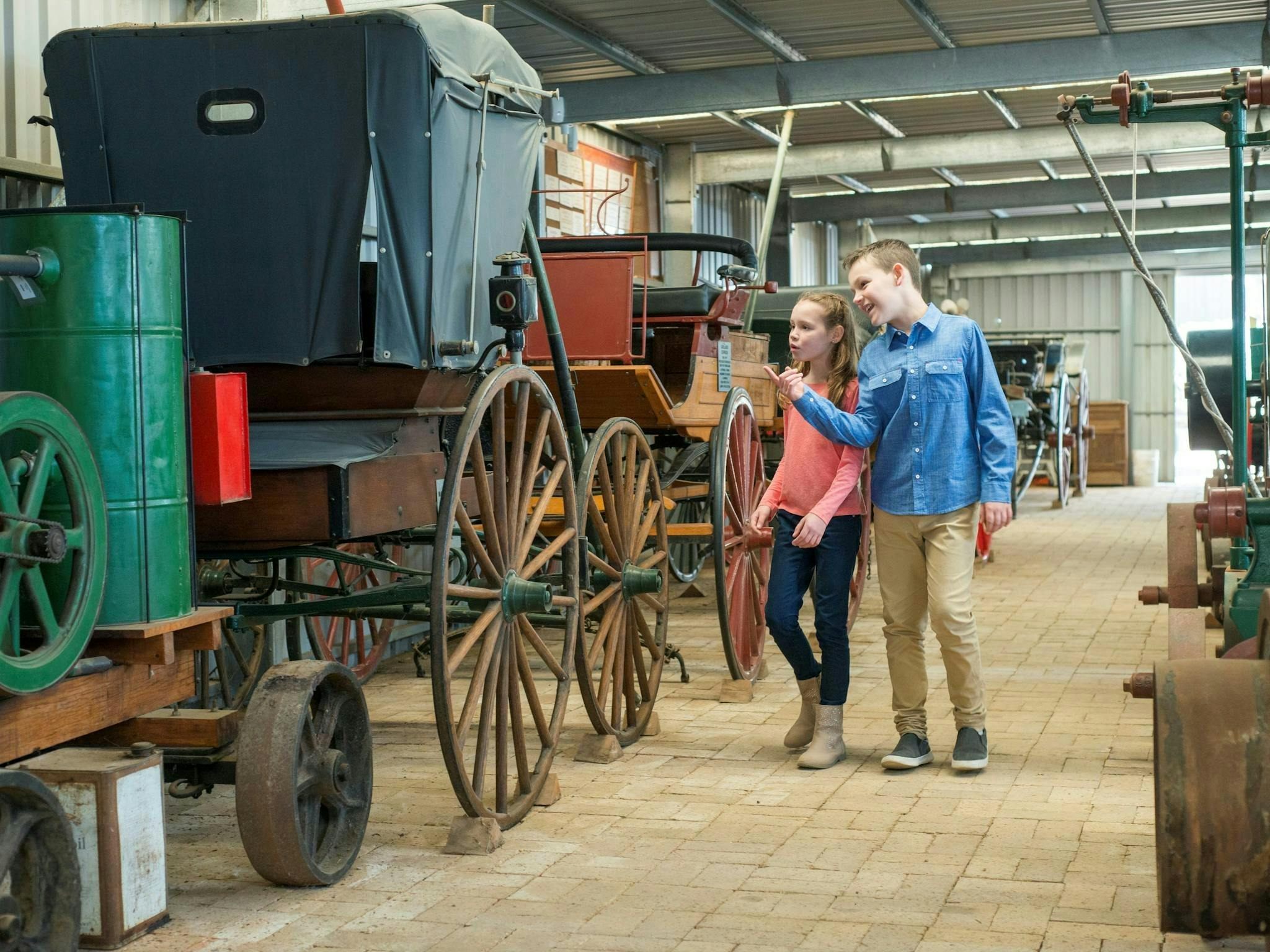 Children walking through Captain's Cottage Museum