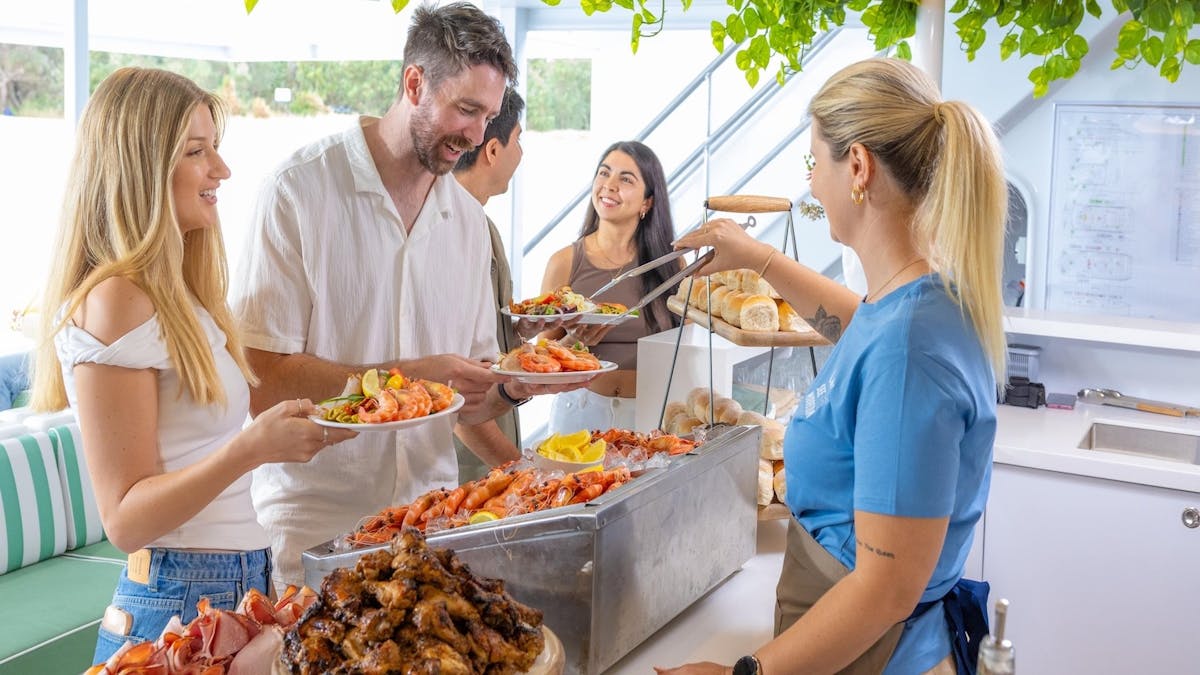 A tropical buffet lunch on the See Moreton vessel, featuring fresh prawns in a luxurious setting