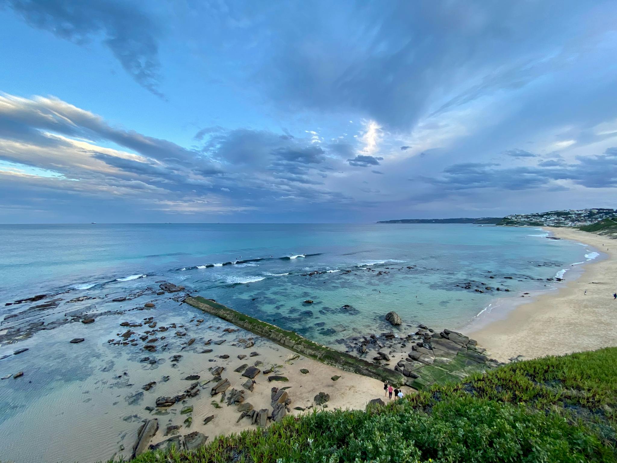 View of a beach called Bar Beach at low tide