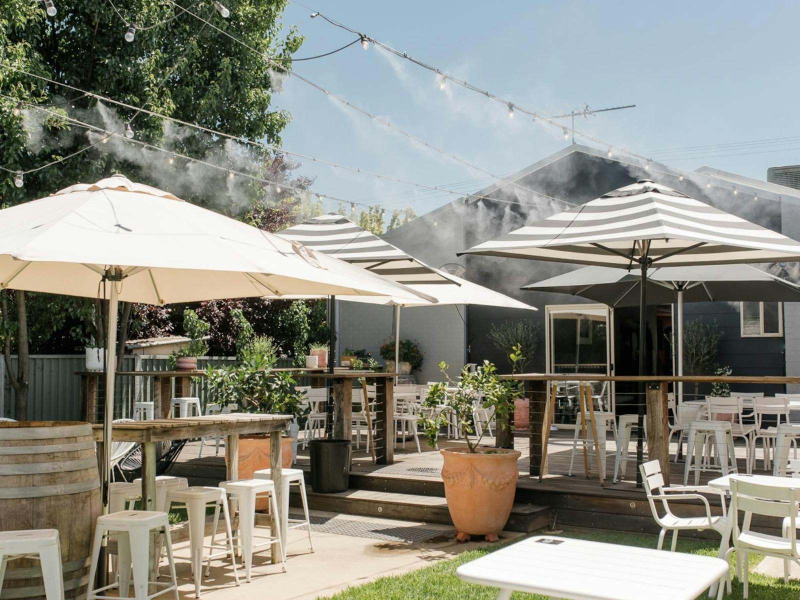 Enjoy the outdoor area (off the Main Street at rear of our cellar door) with misting system.