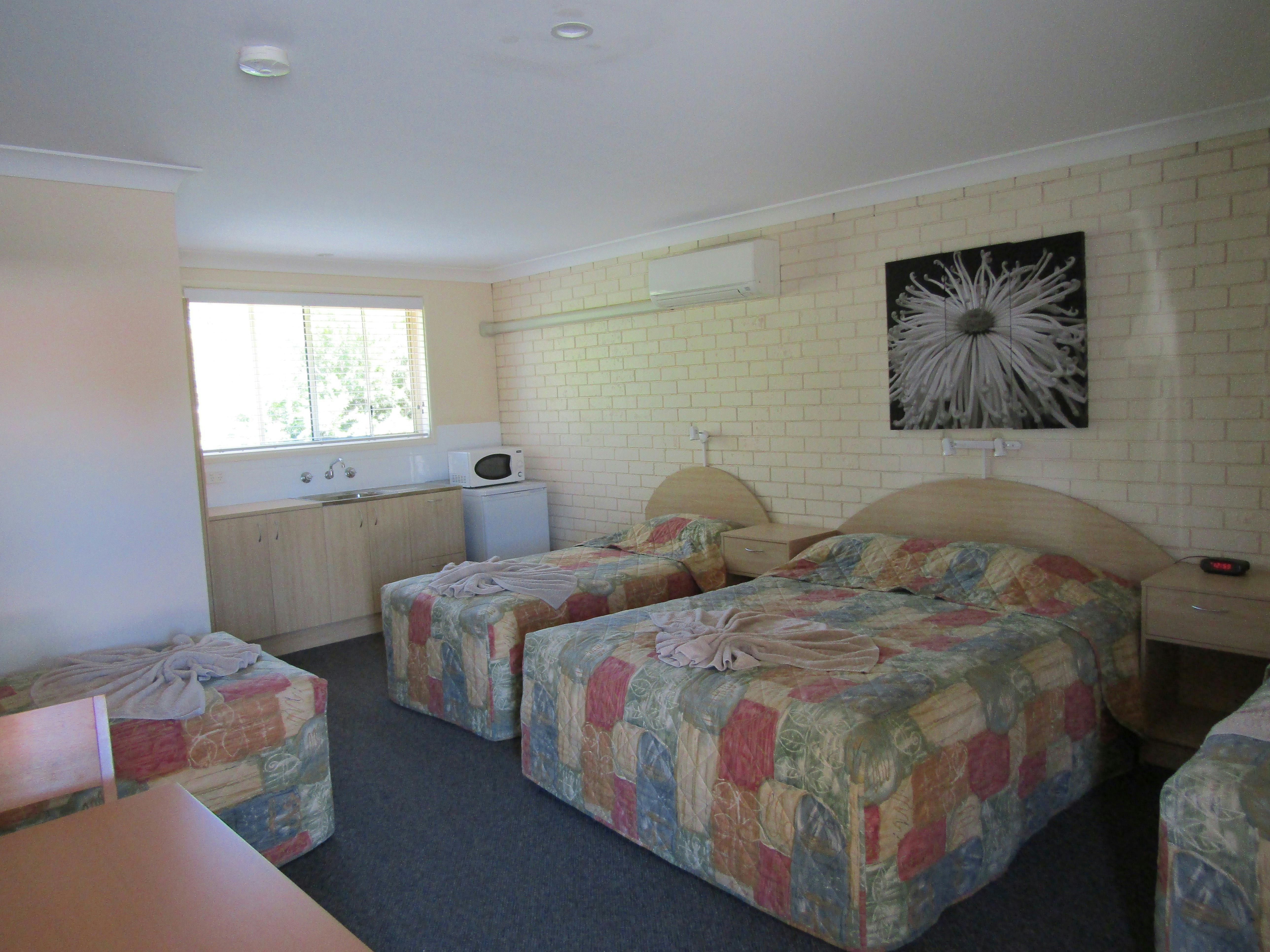 1 Family Room, 1 Queen Bed and 3 Single Beds