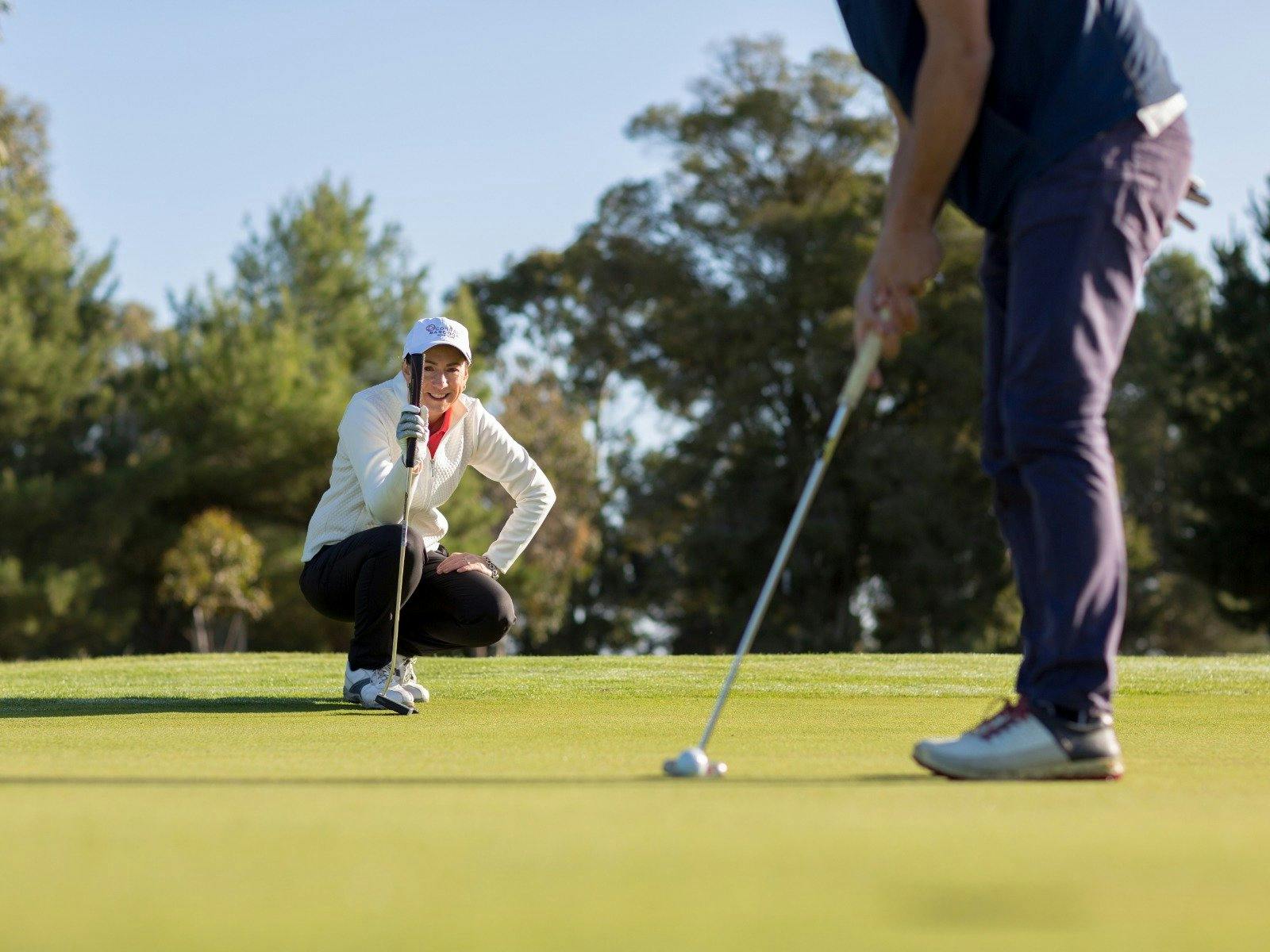 Putting on Golf Green