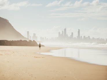 Man walking at Palm Beach Man walking at Palm Beach