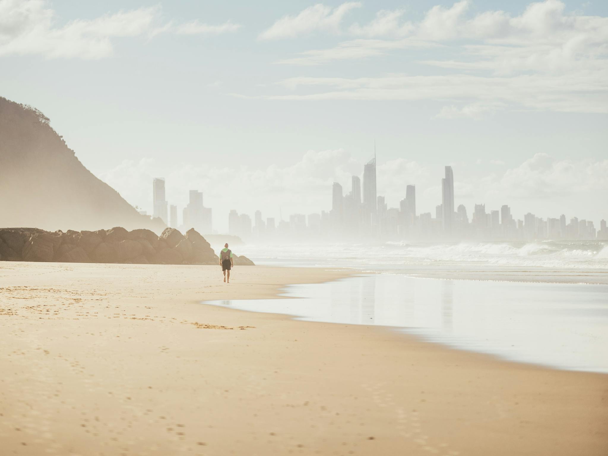 Man walking at Palm Beach Man walking at Palm Beach