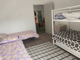 2 single beds and 1 set bunk beds trundle bed also available