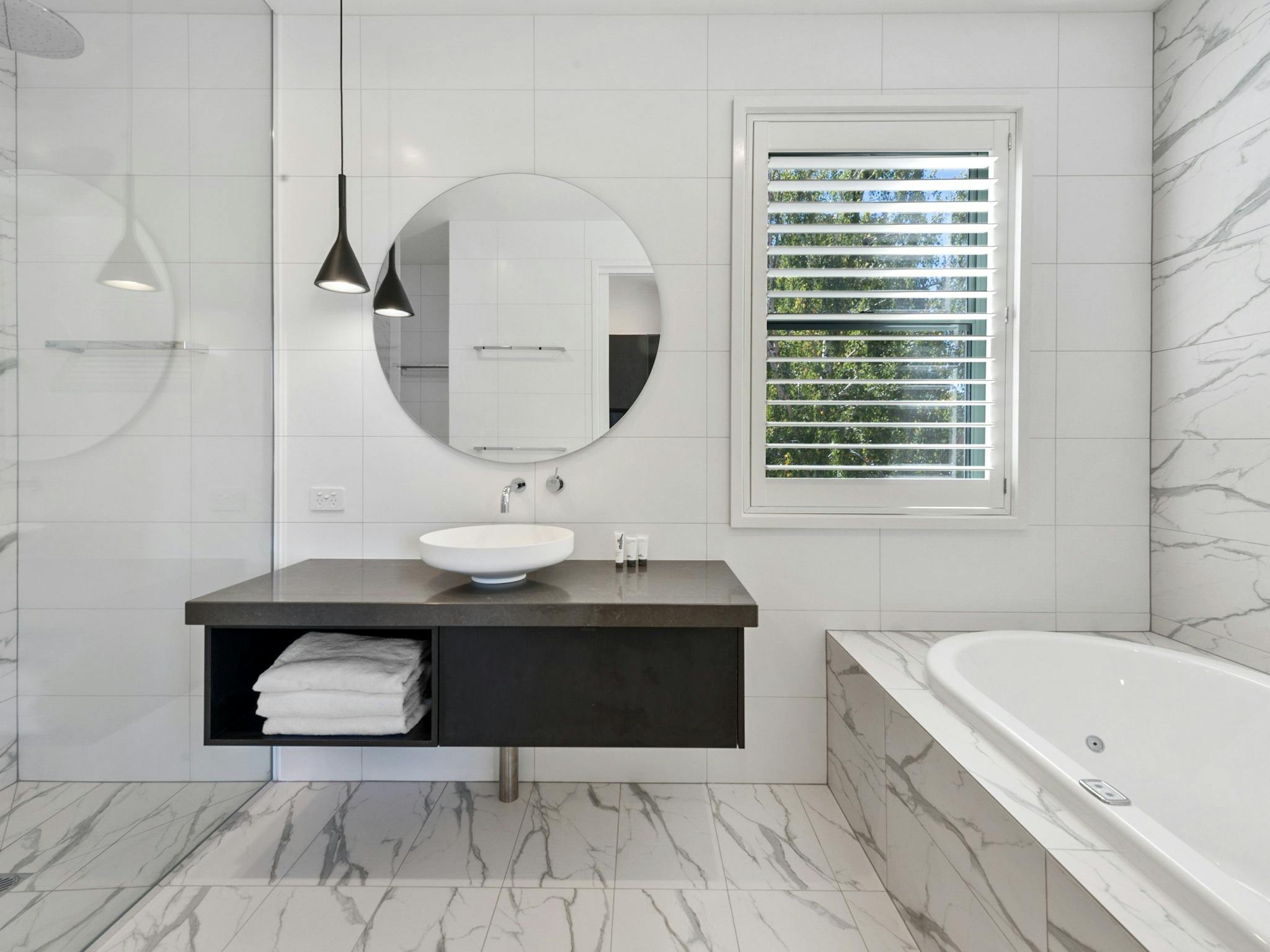 The Gateway's Studio Spa Apartments offer a spacious bathroom with spa bath & MILK toiletries