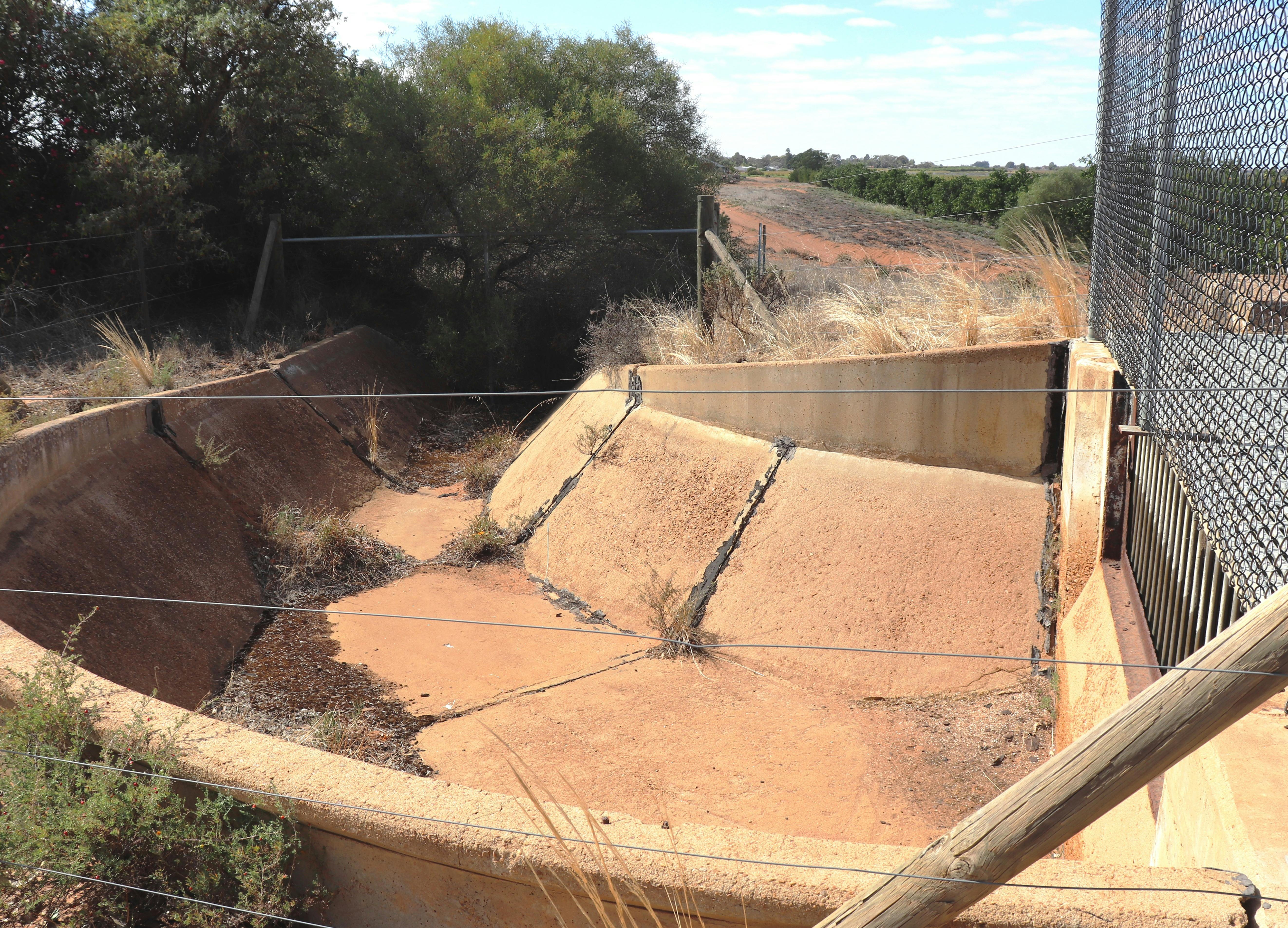 Part of the irrigation channel is still visible to the left of the monument.